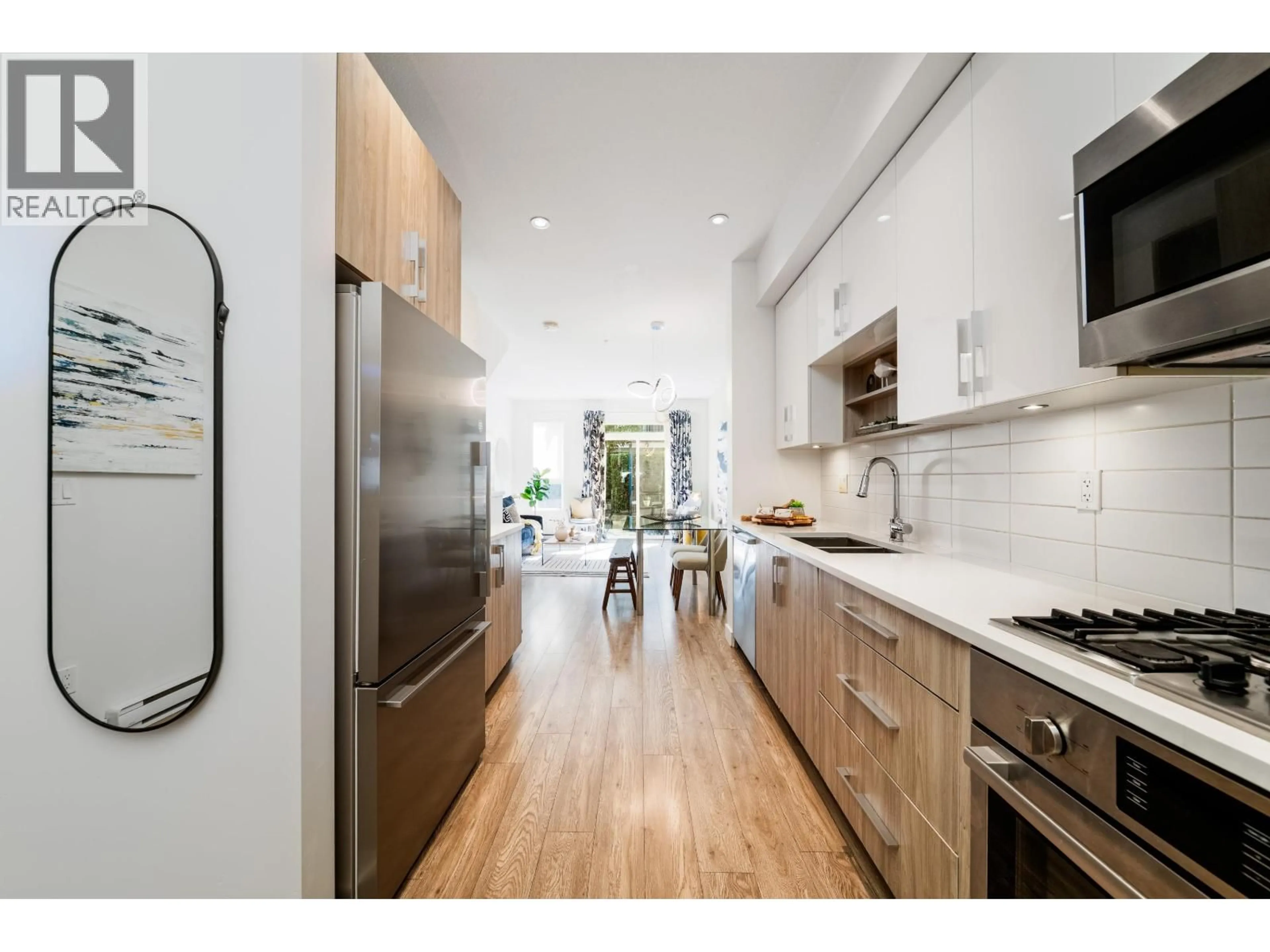 Open concept kitchen, unknown for 18 - 7039 MACPHERSON AVENUE, Burnaby British Columbia V5J4N4