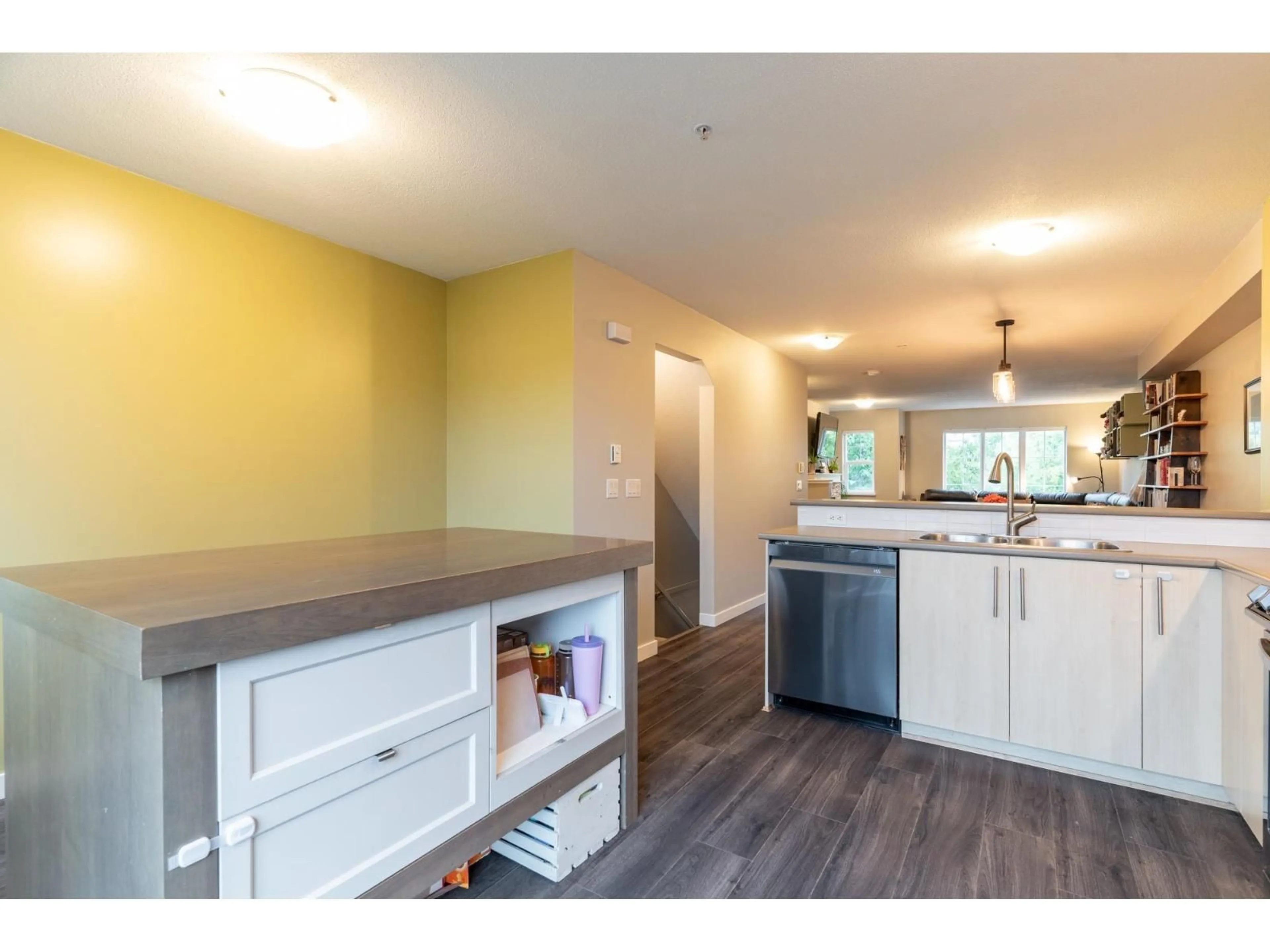 Open concept kitchen, wood/laminate floor for 154 - 20875 80, Langley British Columbia V2Y0B2