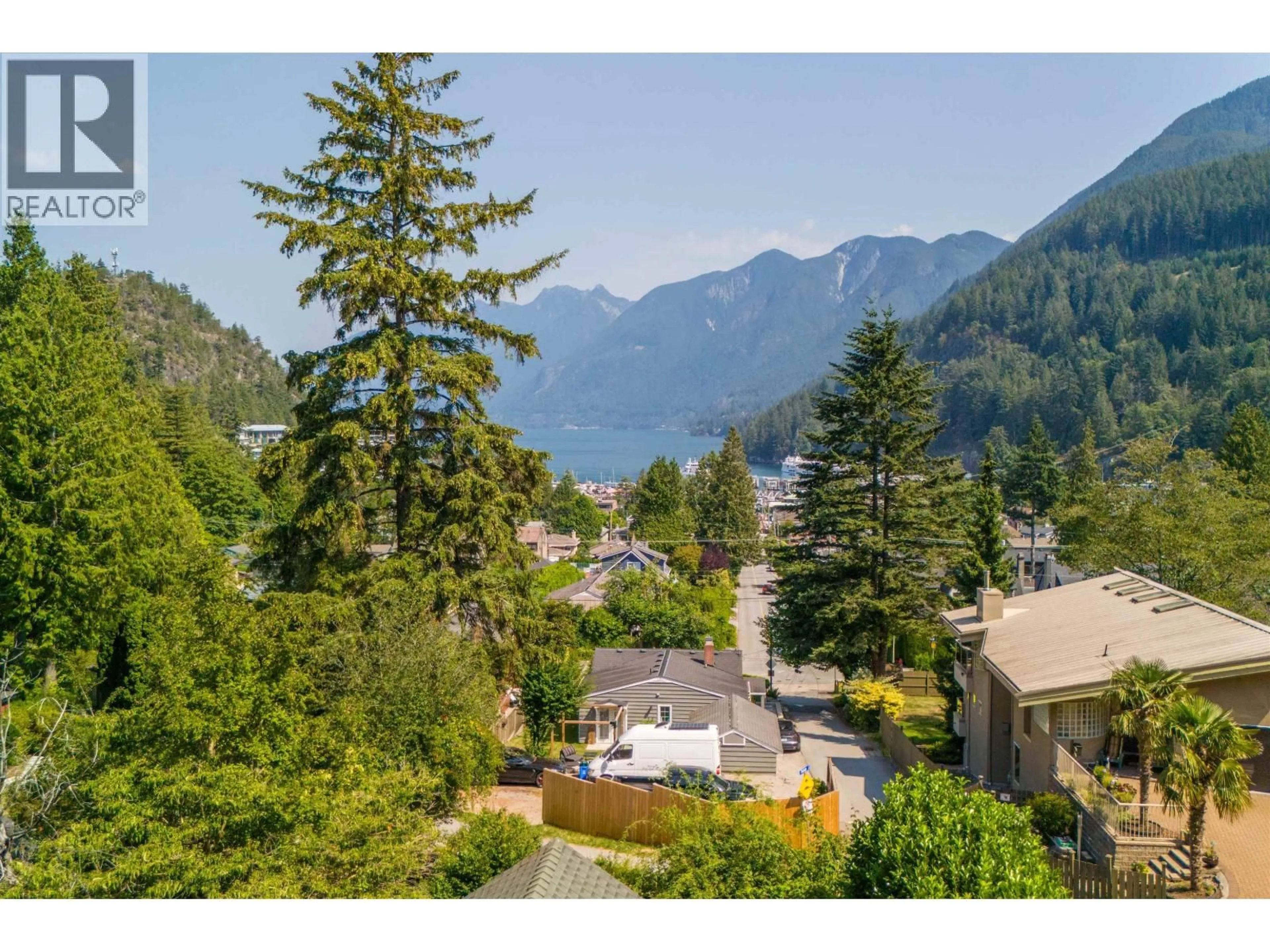 A pic from outside/outdoor area/front of a property/back of a property/a pic from drone, mountain view for 6467 RALEIGH STREET, West Vancouver British Columbia V7W2C9