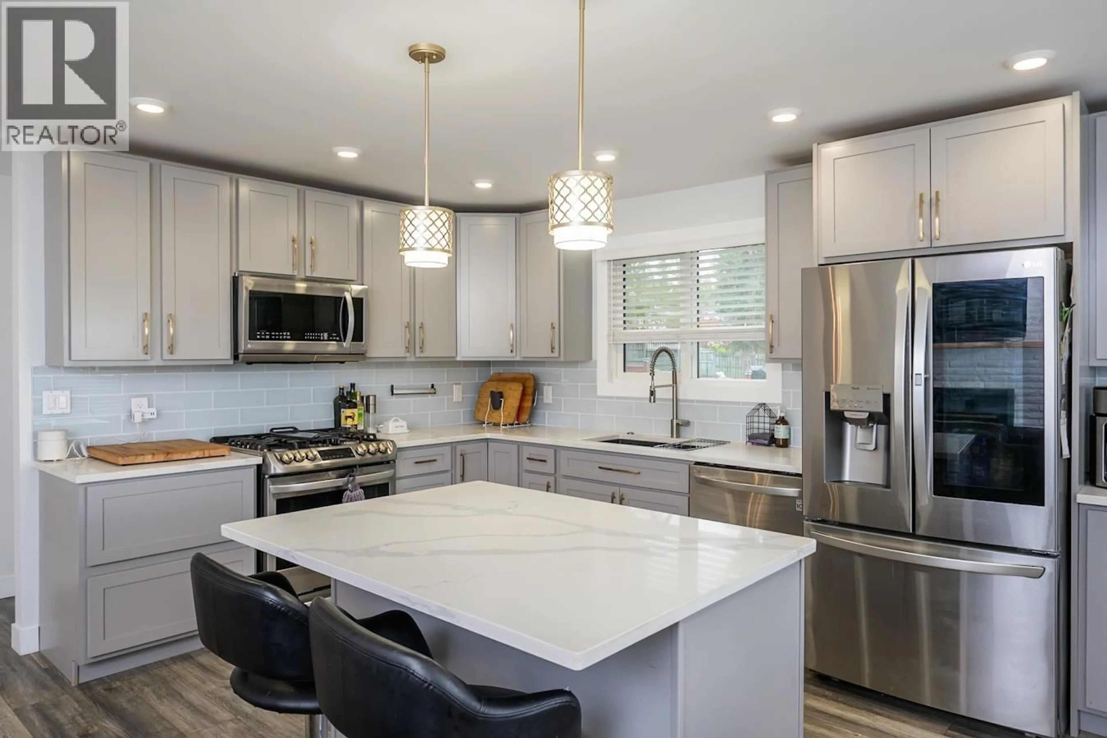 Open concept kitchen, ceramic/tile floor for 7190 THOMPSON DRIVE, Prince George British Columbia V2N5N4