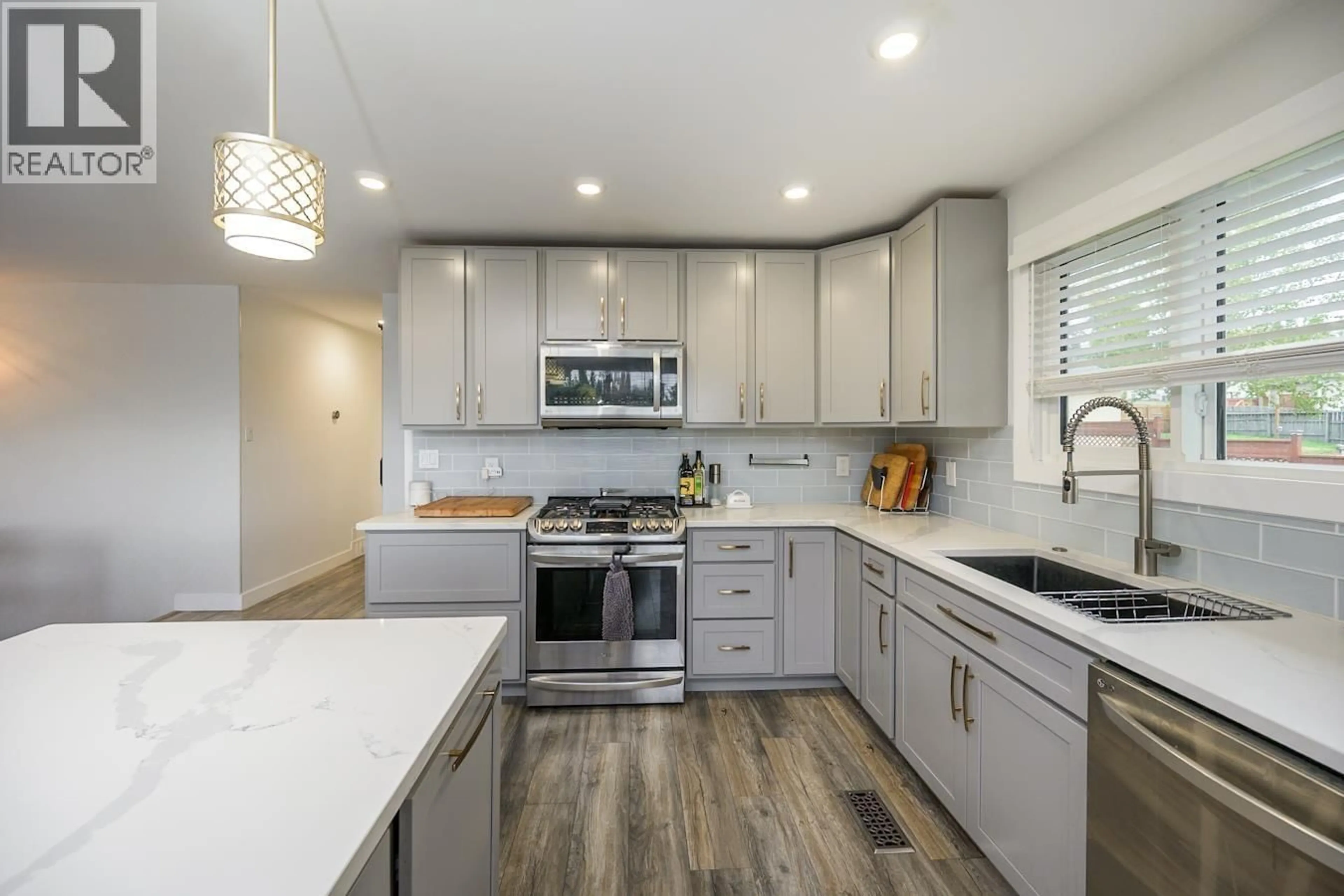 Open concept kitchen, ceramic/tile floor for 7190 THOMPSON DRIVE, Prince George British Columbia V2N5N4