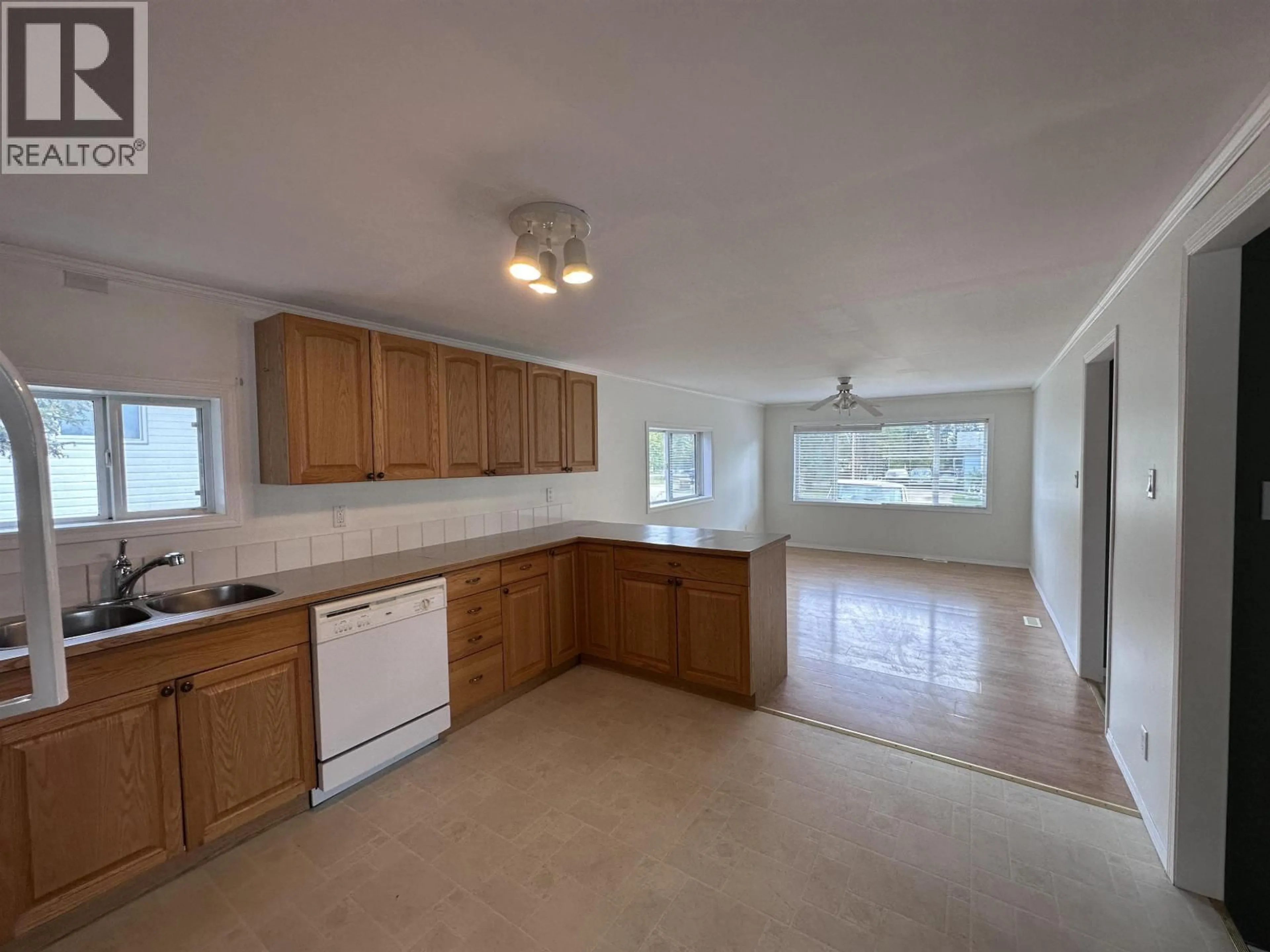 Open concept kitchen, ceramic/tile floor for 5255 43 STREET, Fort Nelson British Columbia V0C1R0