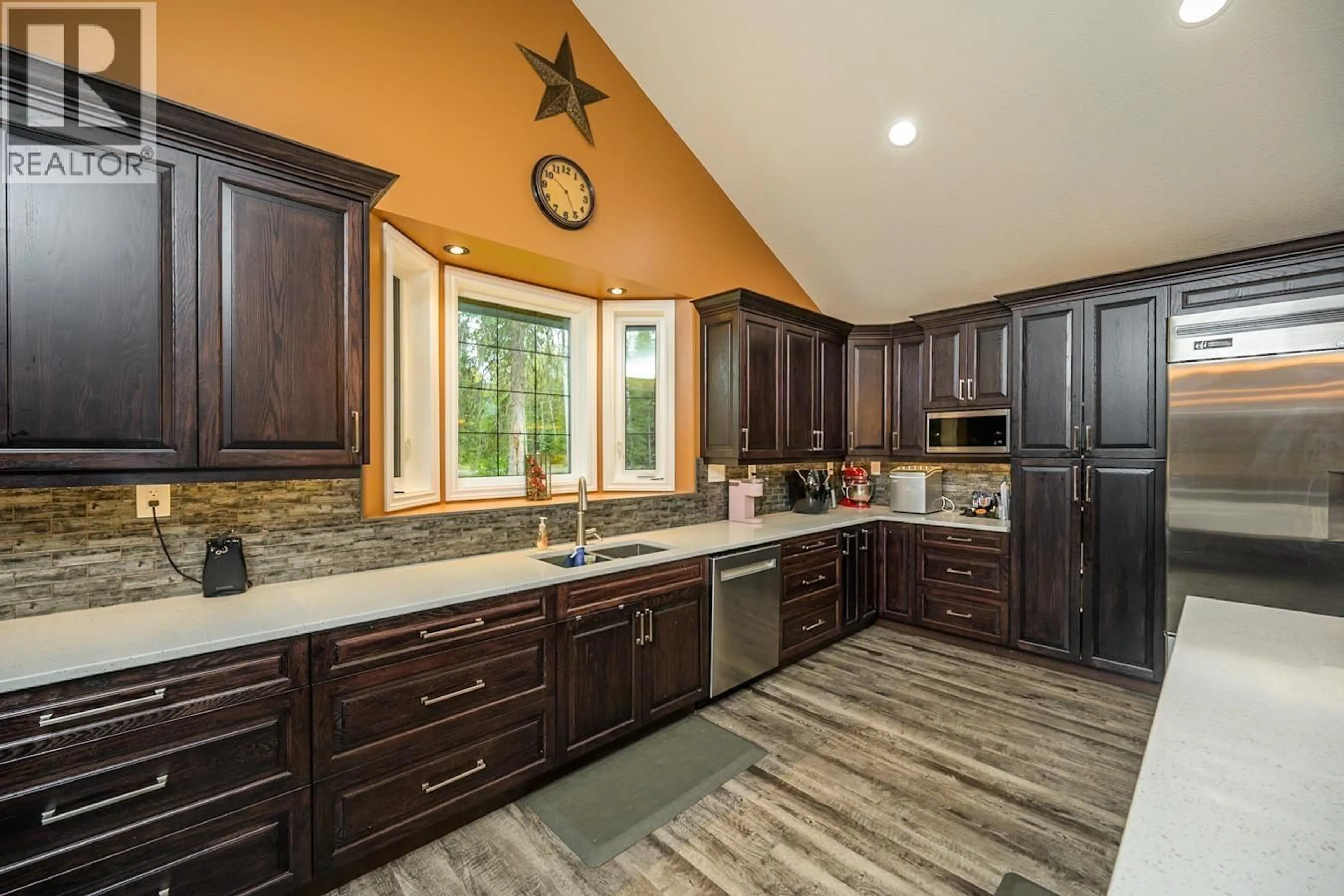 Open concept kitchen, ceramic/tile floor for 4438 HANET ROAD, Prince George British Columbia V2K5S1