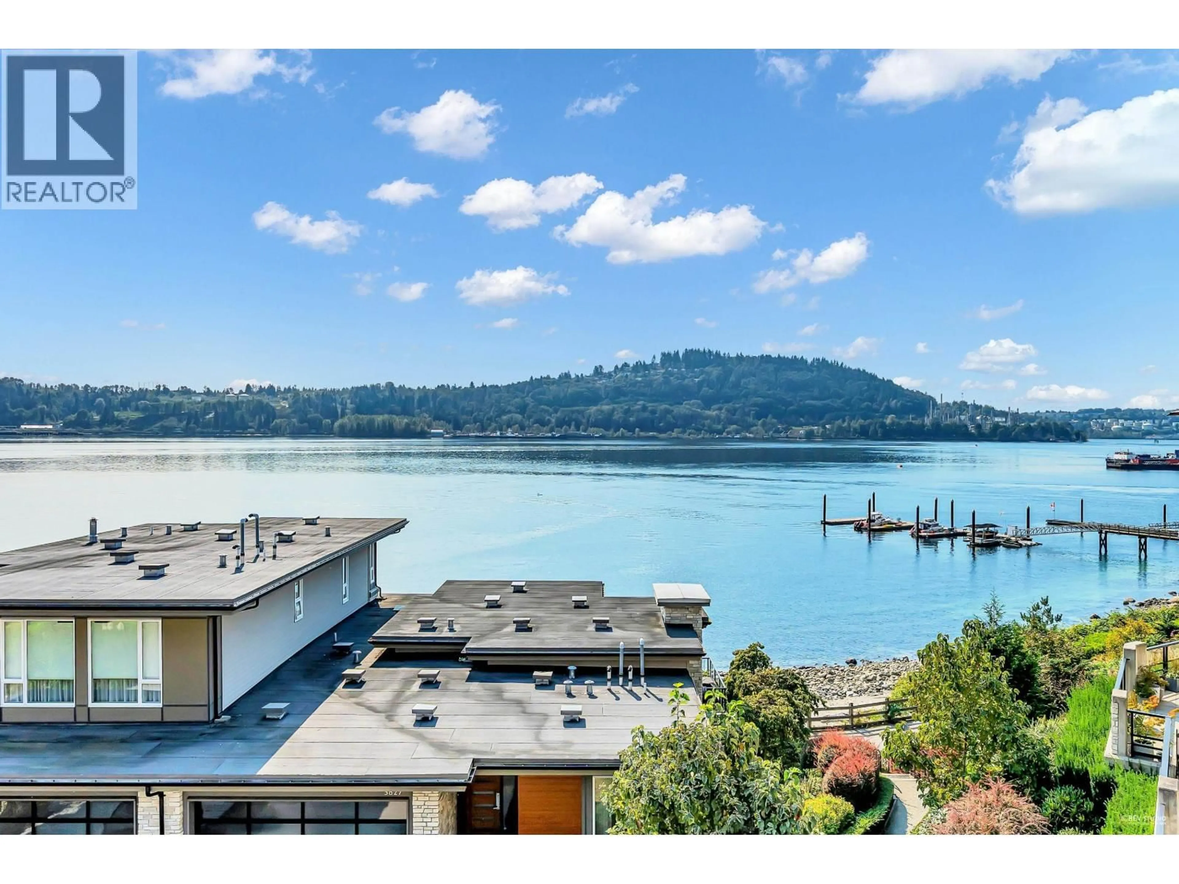 A pic from outside/outdoor area/front of a property/back of a property/a pic from drone, water/lake/river/ocean view for 308 - 3825 CATES LANDING WAY, North Vancouver British Columbia V7G0A6