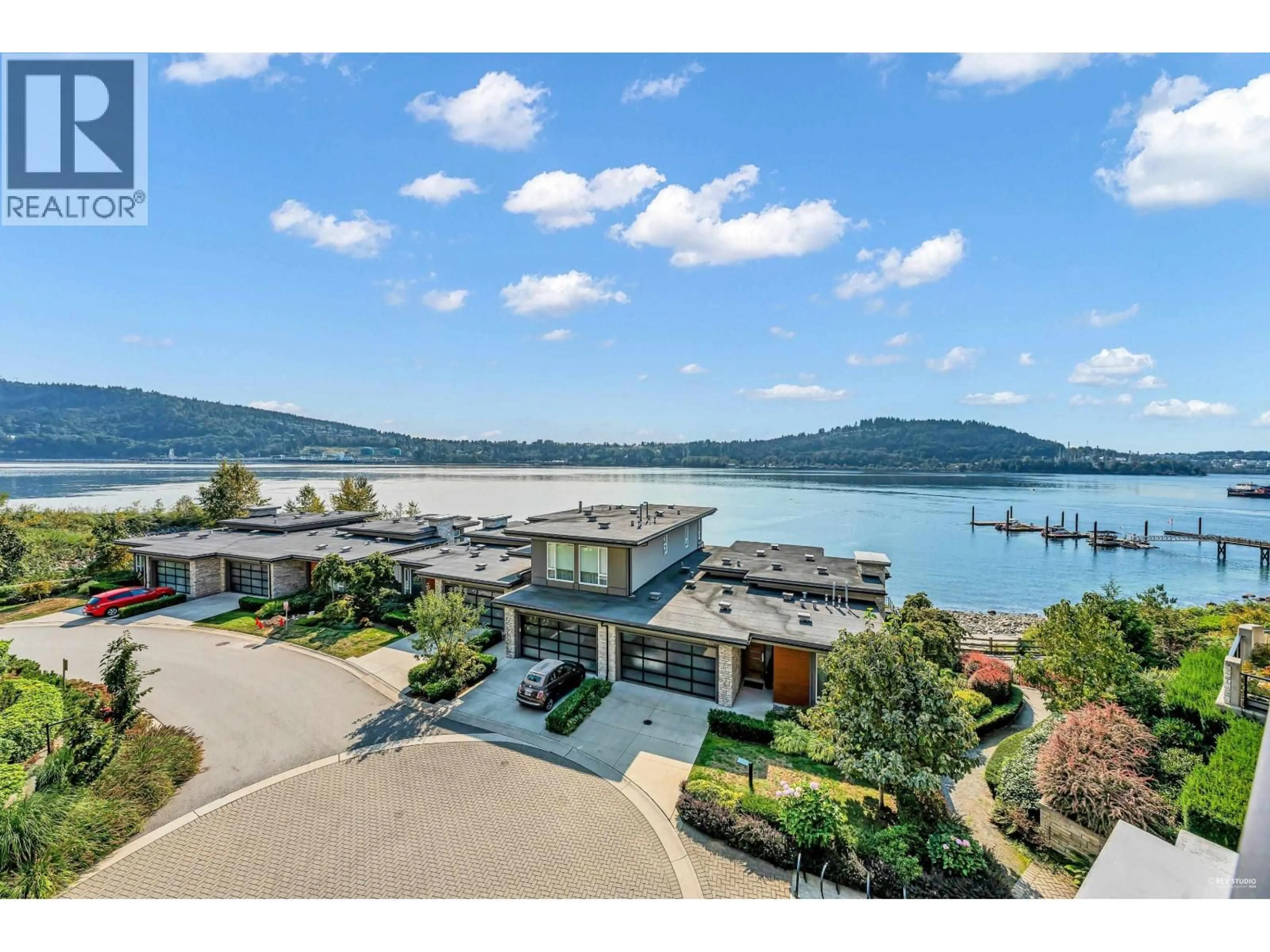 A pic from outside/outdoor area/front of a property/back of a property/a pic from drone, water/lake/river/ocean view for 308 - 3825 CATES LANDING WAY, North Vancouver British Columbia V7G0A6