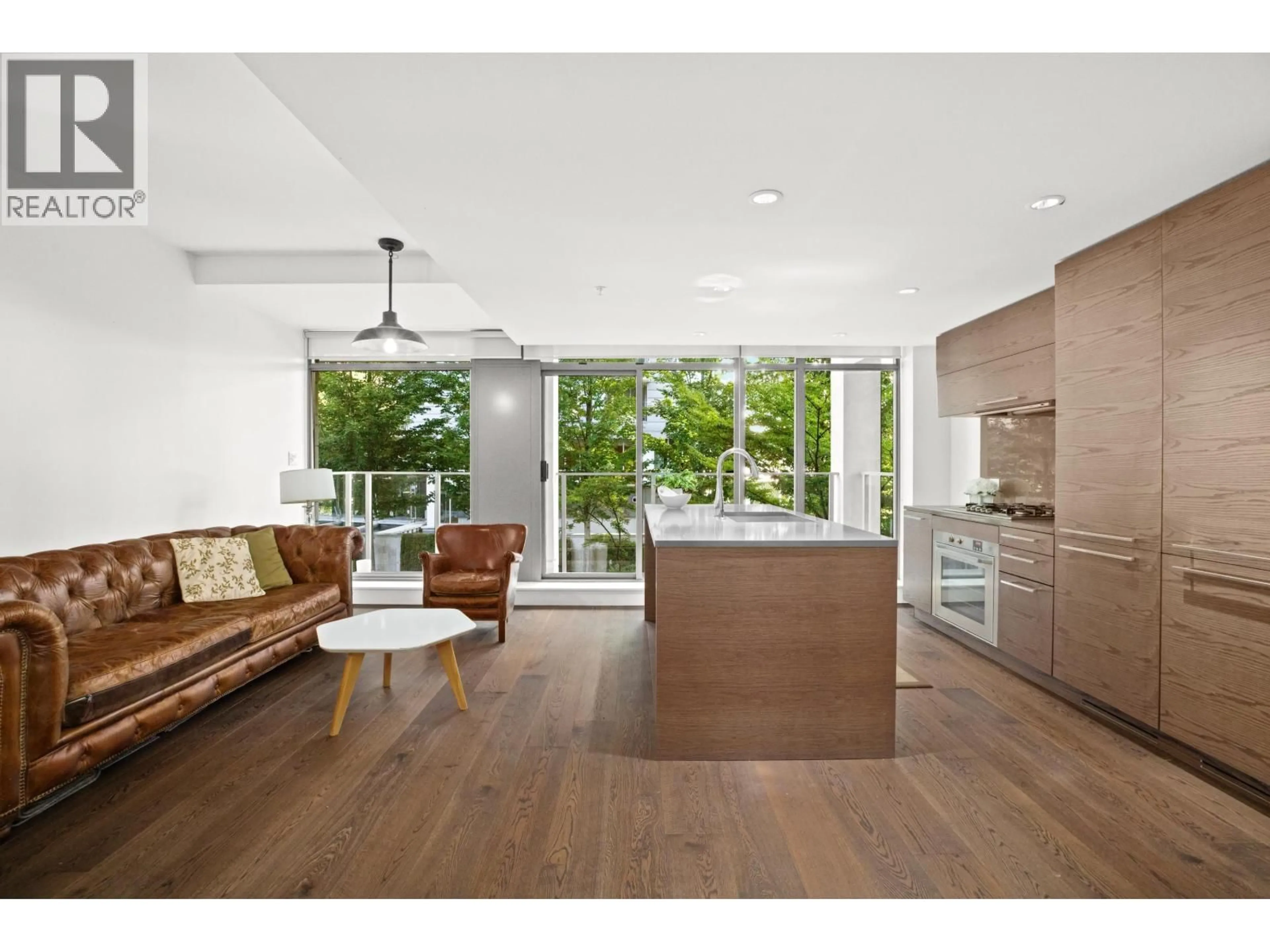 Open concept kitchen, wood/laminate floor for 205 - 5782 BERTON AVENUE, Vancouver British Columbia V6S0C1