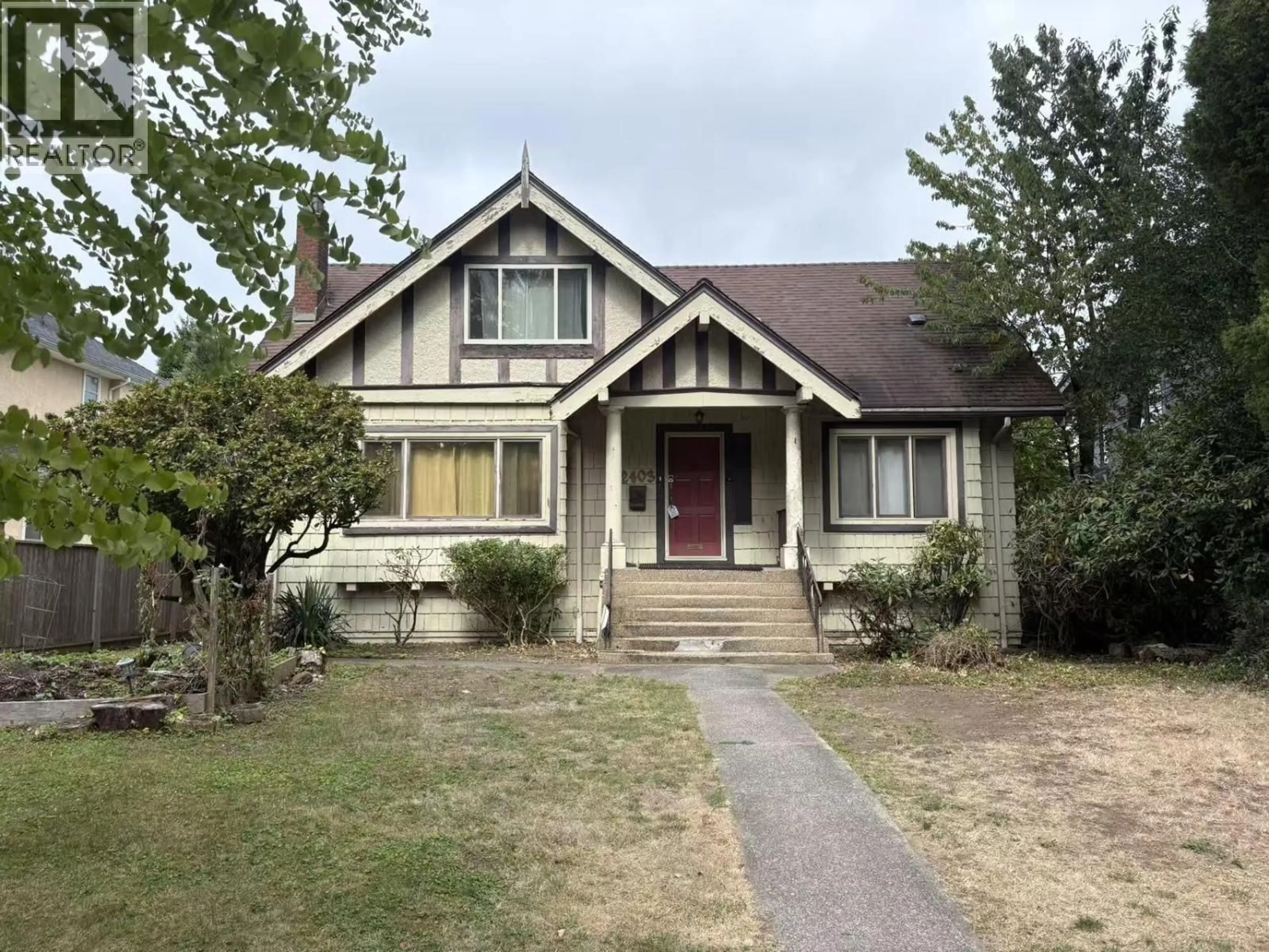 Home with vinyl exterior material, street for 2403 34TH AVENUE, Vancouver British Columbia V6M1G8