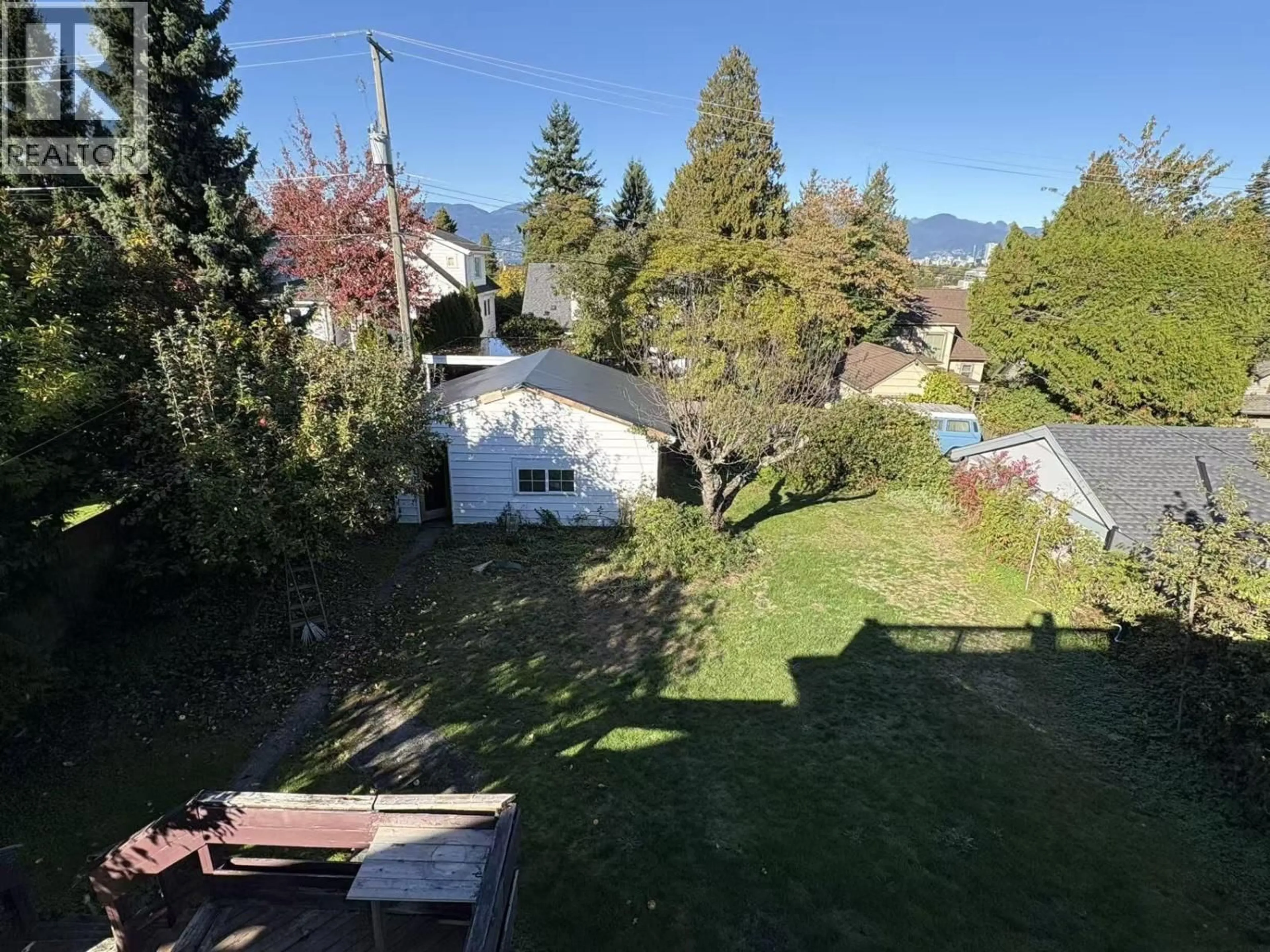 A pic from outside/outdoor area/front of a property/back of a property/a pic from drone, mountain view for 2403 34TH AVENUE, Vancouver British Columbia V6M1G8