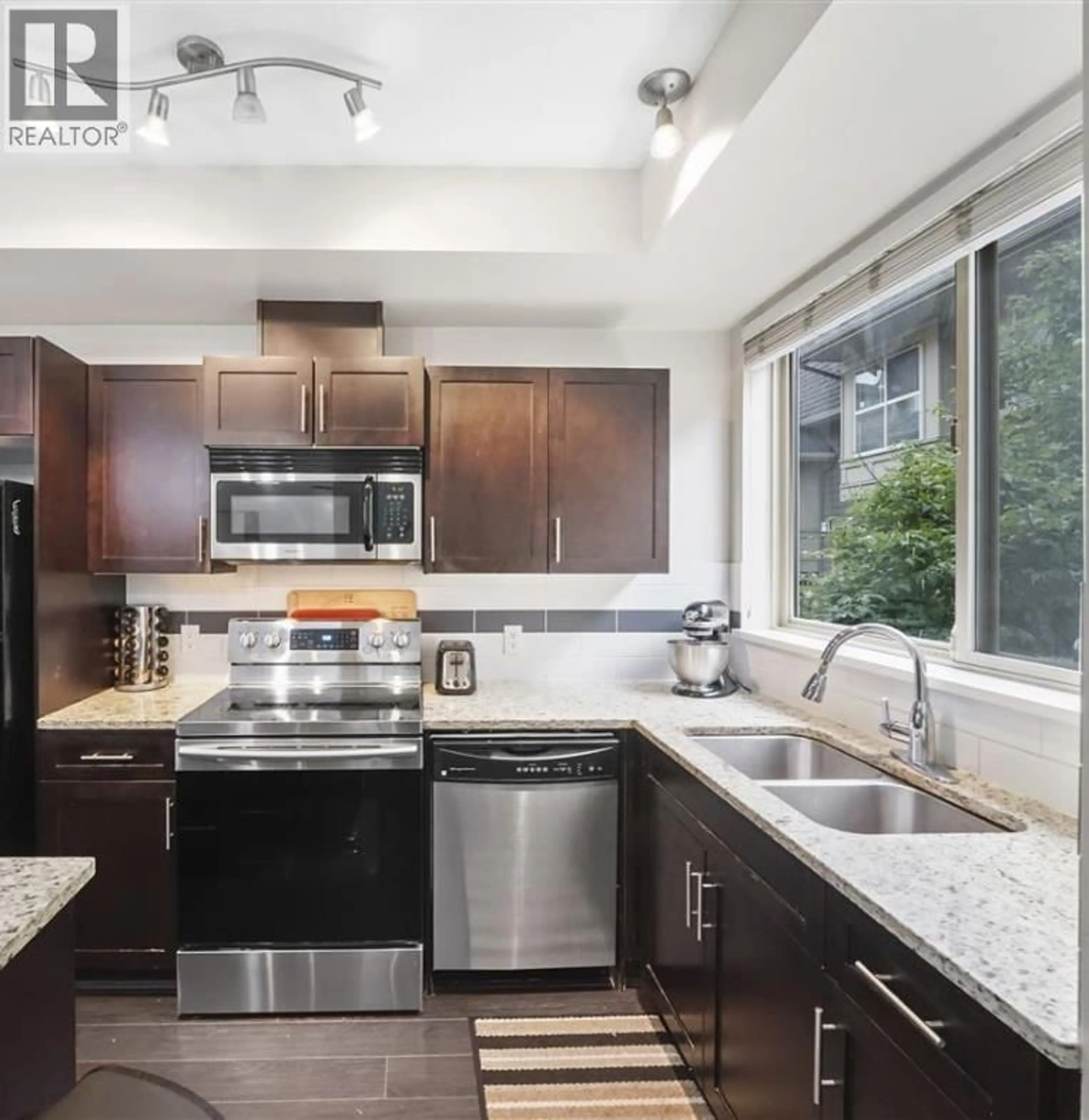 Open concept kitchen, unknown for 228 - 2108 ROWLAND STREET, Port Coquitlam British Columbia V3C0C1
