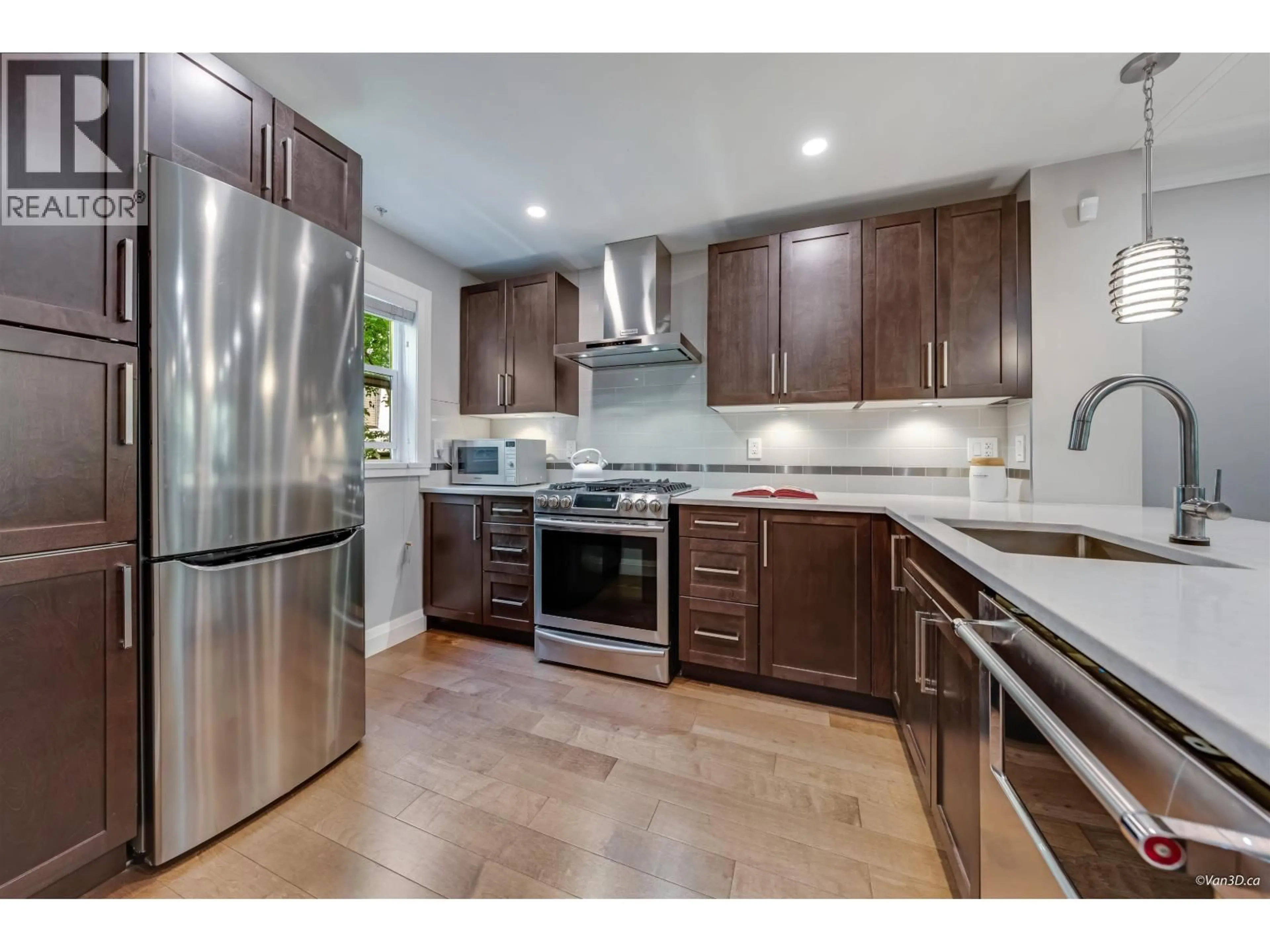 Open concept kitchen, unknown for 309 - 7000 21ST AVENUE, Burnaby British Columbia V5E4P1