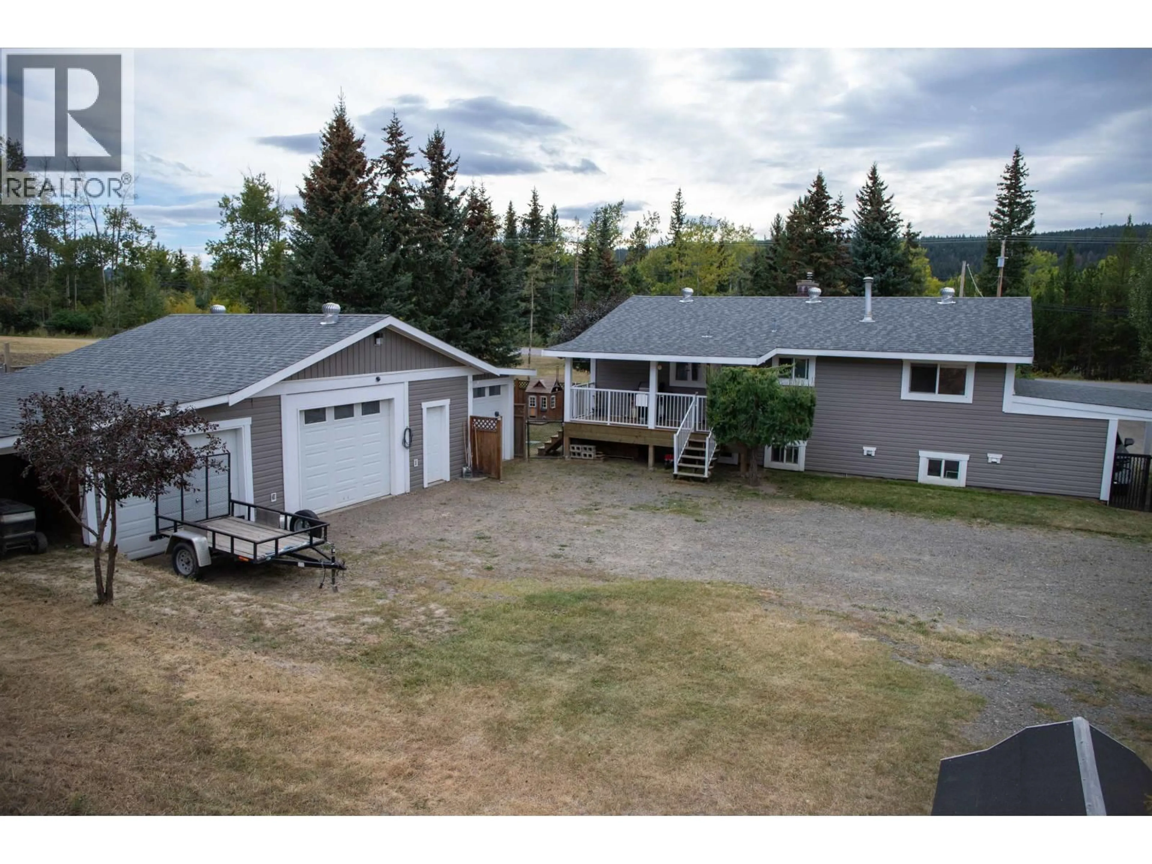 A pic from outside/outdoor area/front of a property/back of a property/a pic from drone, unknown for 5665 HORSE LAKE ROAD, 100 Mile House British Columbia V0K2E1