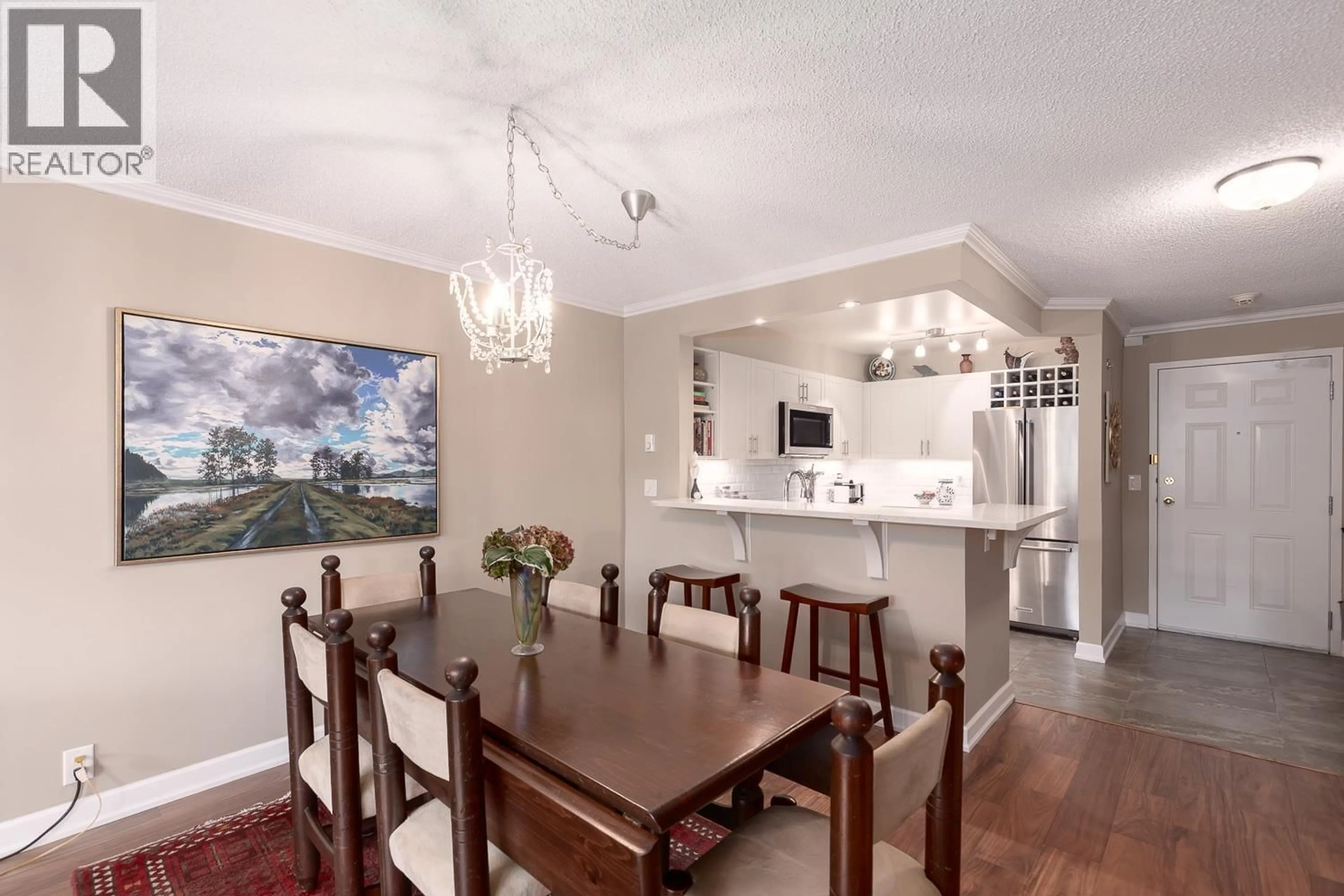 Dining room, wood/laminate floor for 204 - 456 MOBERLY ROAD, Vancouver British Columbia V5Z4L7