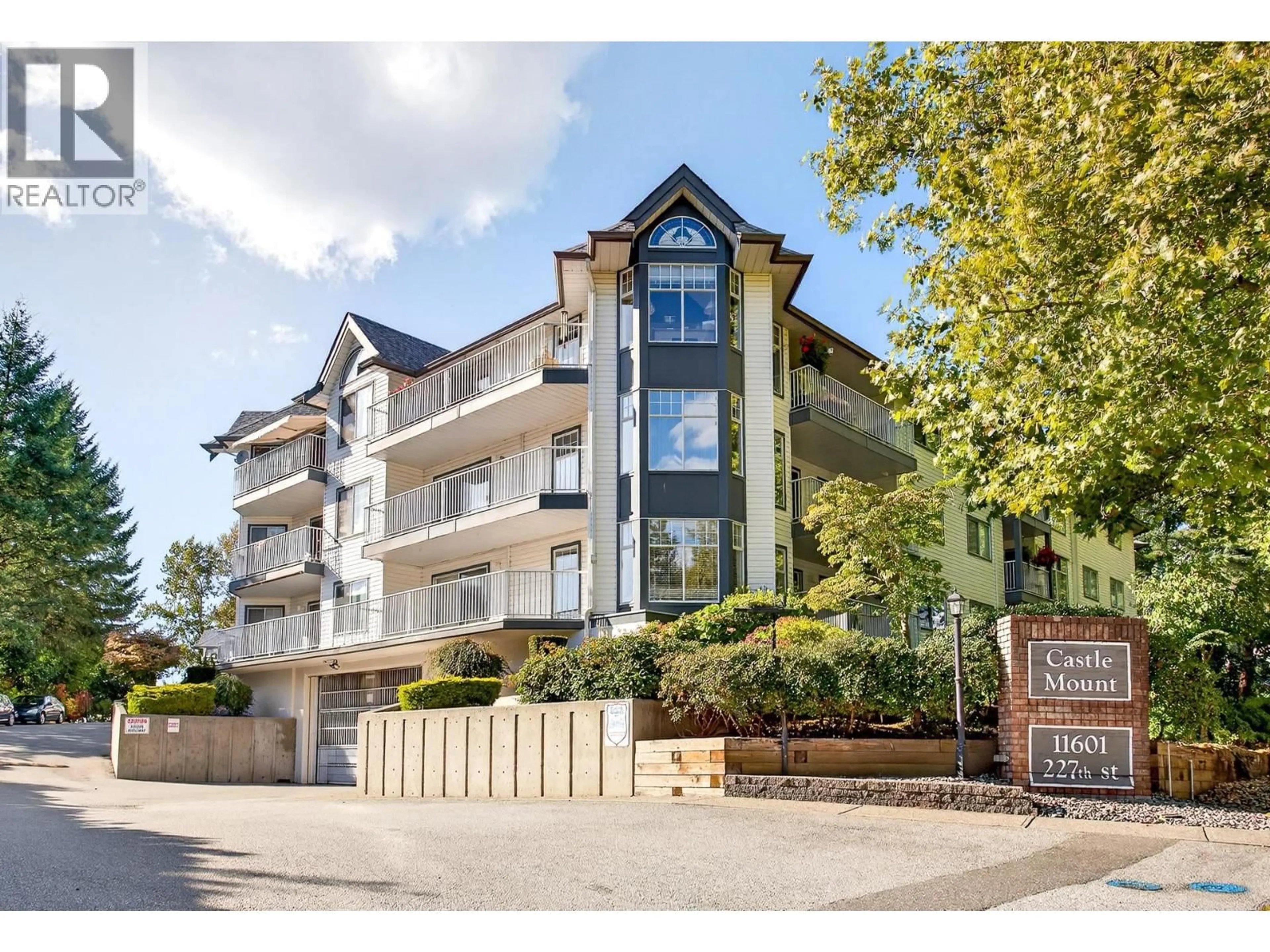 A pic from outside/outdoor area/front of a property/back of a property/a pic from drone, mountain view for 301 - 11601 227 STREET, Maple Ridge British Columbia V2X0J7