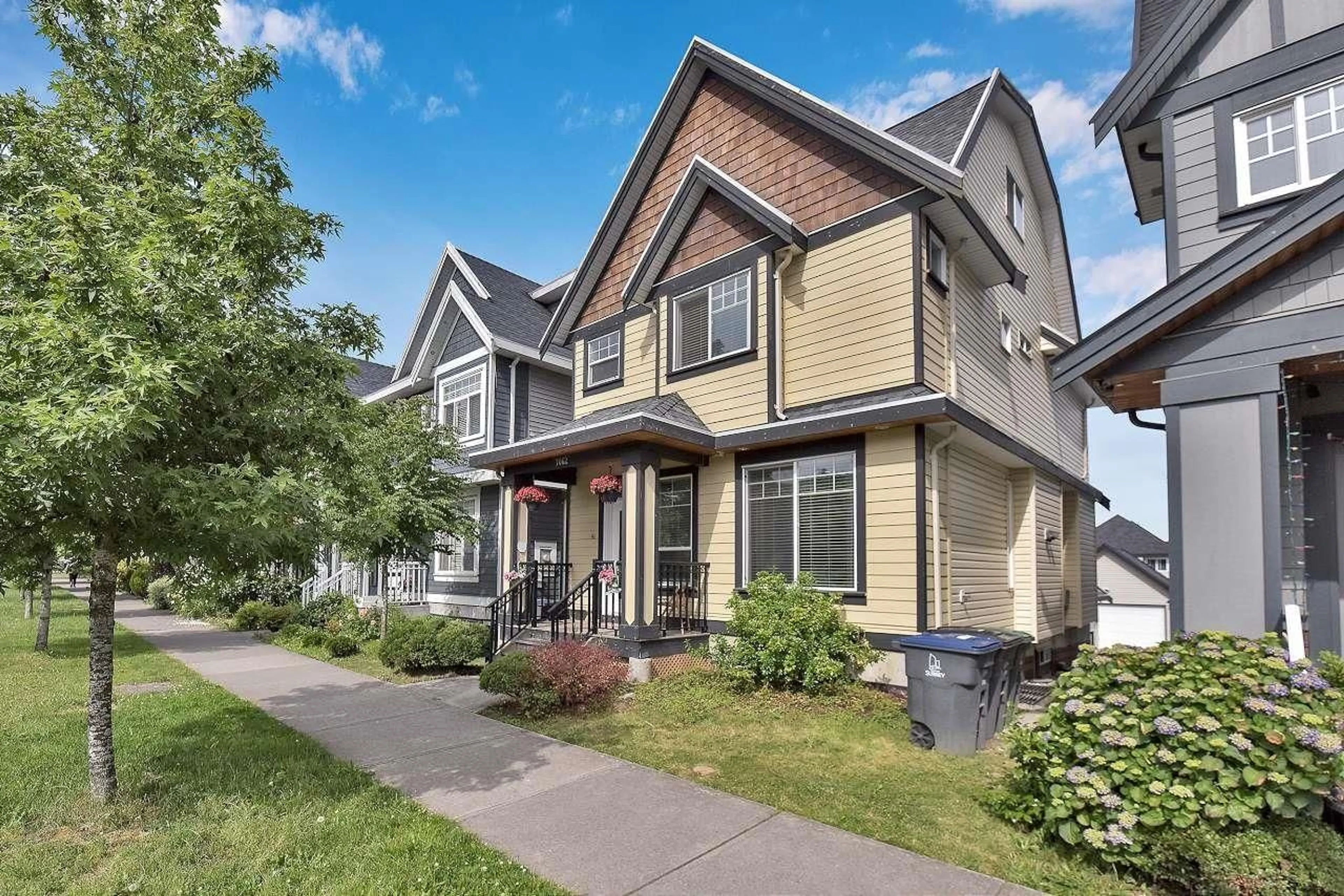 Home with vinyl exterior material, street for 7062 148, Surrey British Columbia V3S2X3