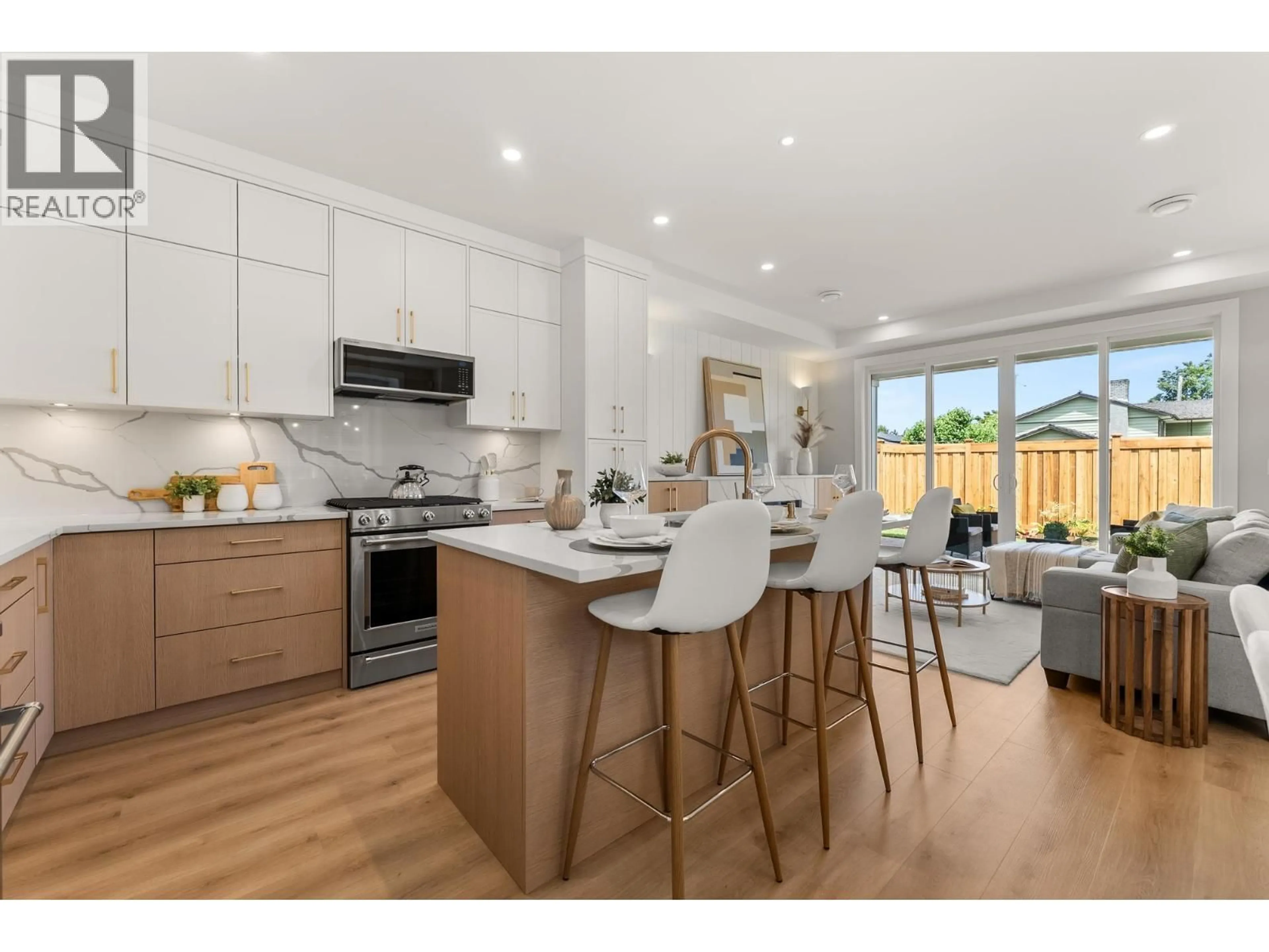 Open concept kitchen, wood/laminate floor for 11811 DUNFORD ROAD, Richmond British Columbia V7E3M6