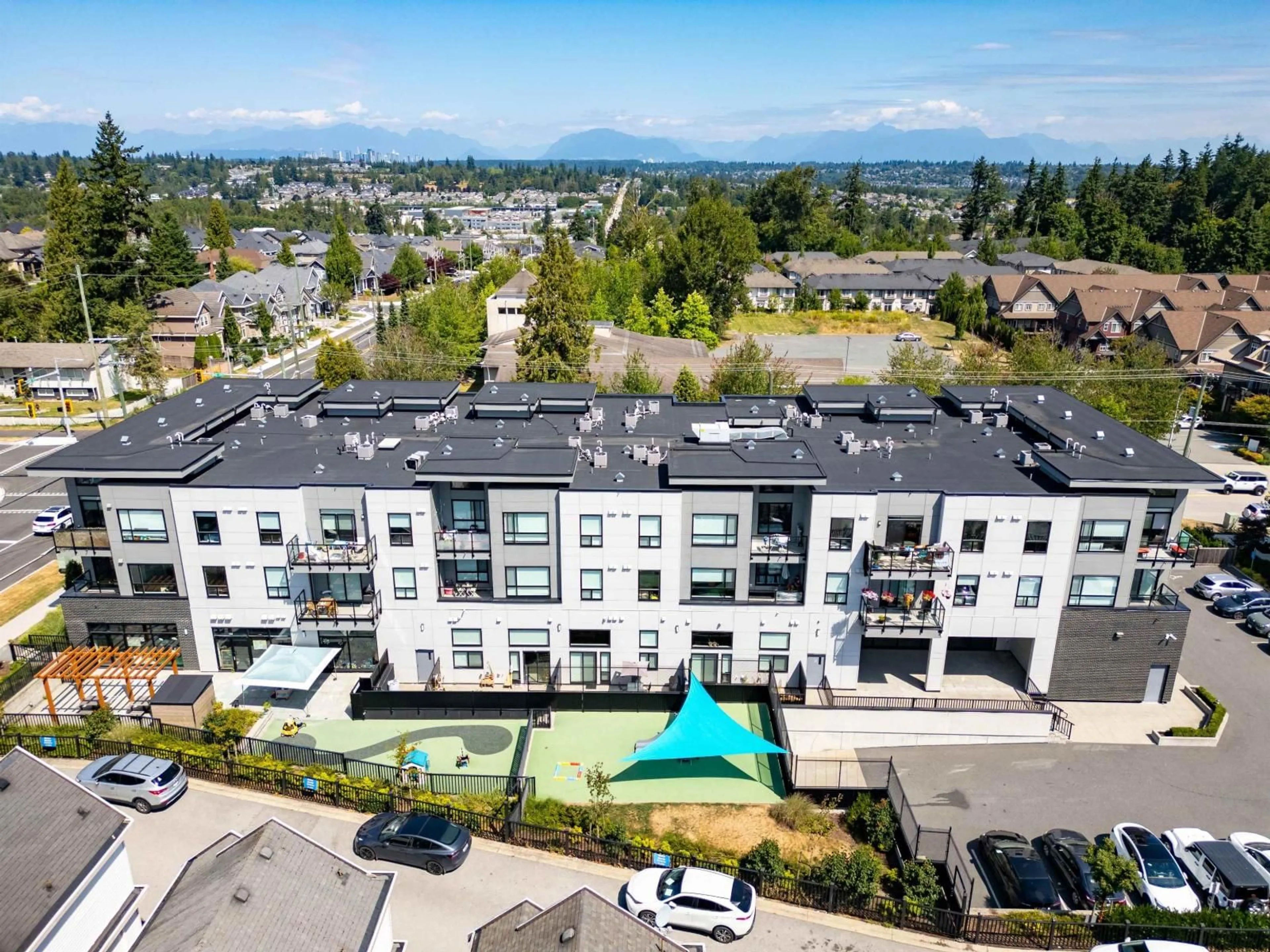 A pic from outside/outdoor area/front of a property/back of a property/a pic from drone, mountain view for 212 - 14818 60, Surrey British Columbia V3S0B5