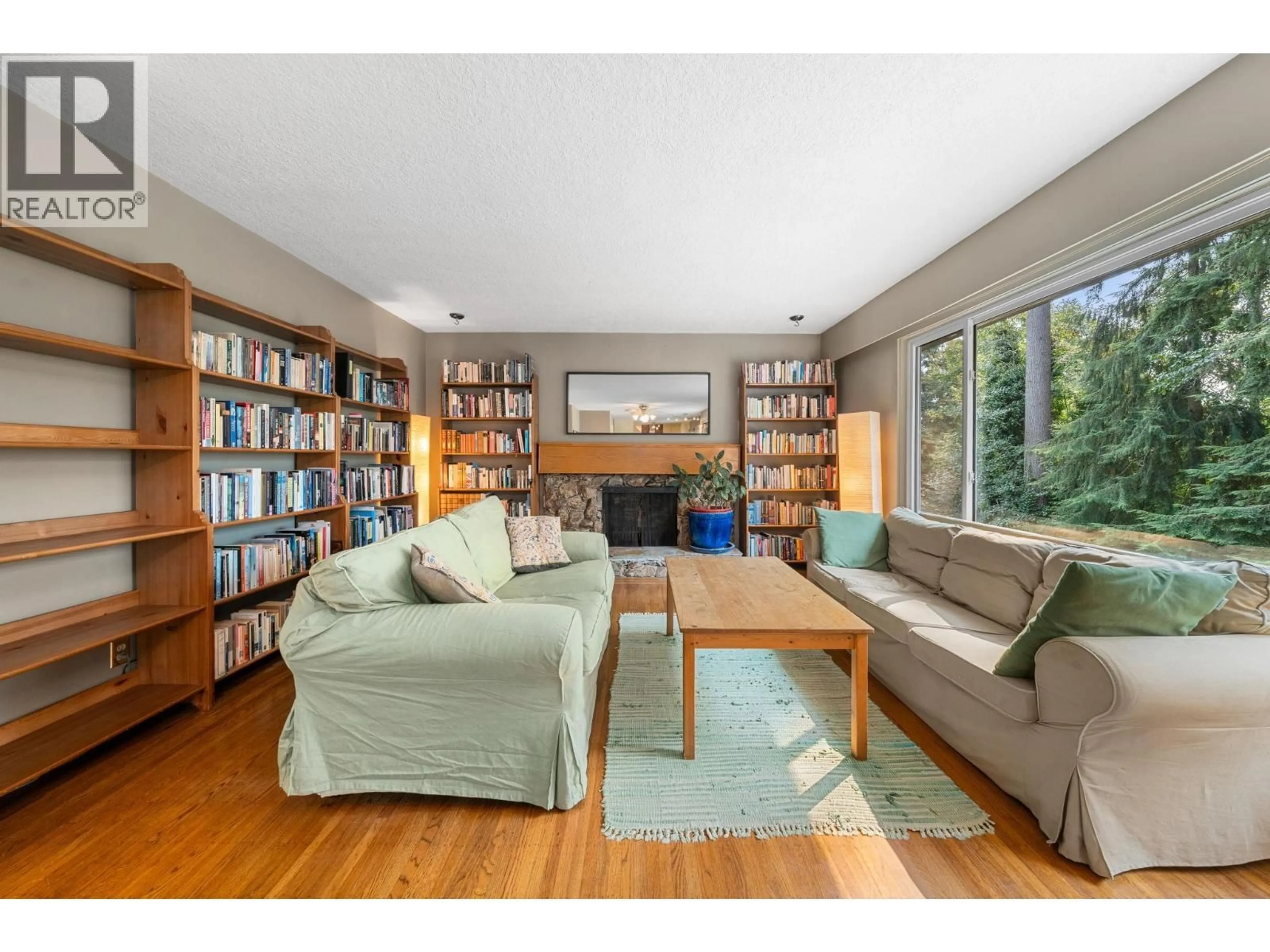 Living room with furniture, wood/laminate floor for 1967 HYANNIS DRIVE, North Vancouver British Columbia V7H2E5