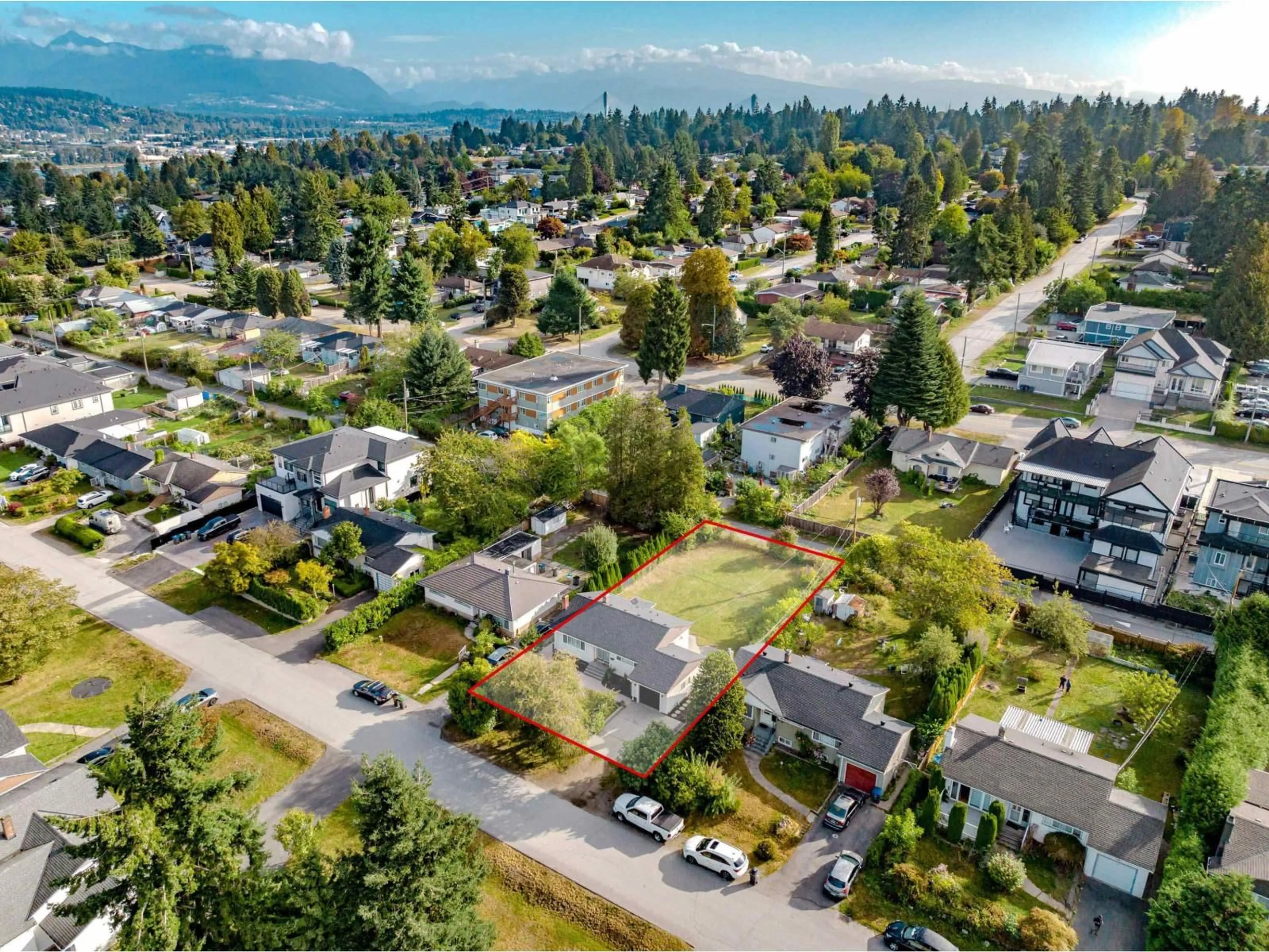A pic from outside/outdoor area/front of a property/back of a property/a pic from drone, mountain view for 11056 135A, Surrey British Columbia V3R3A4