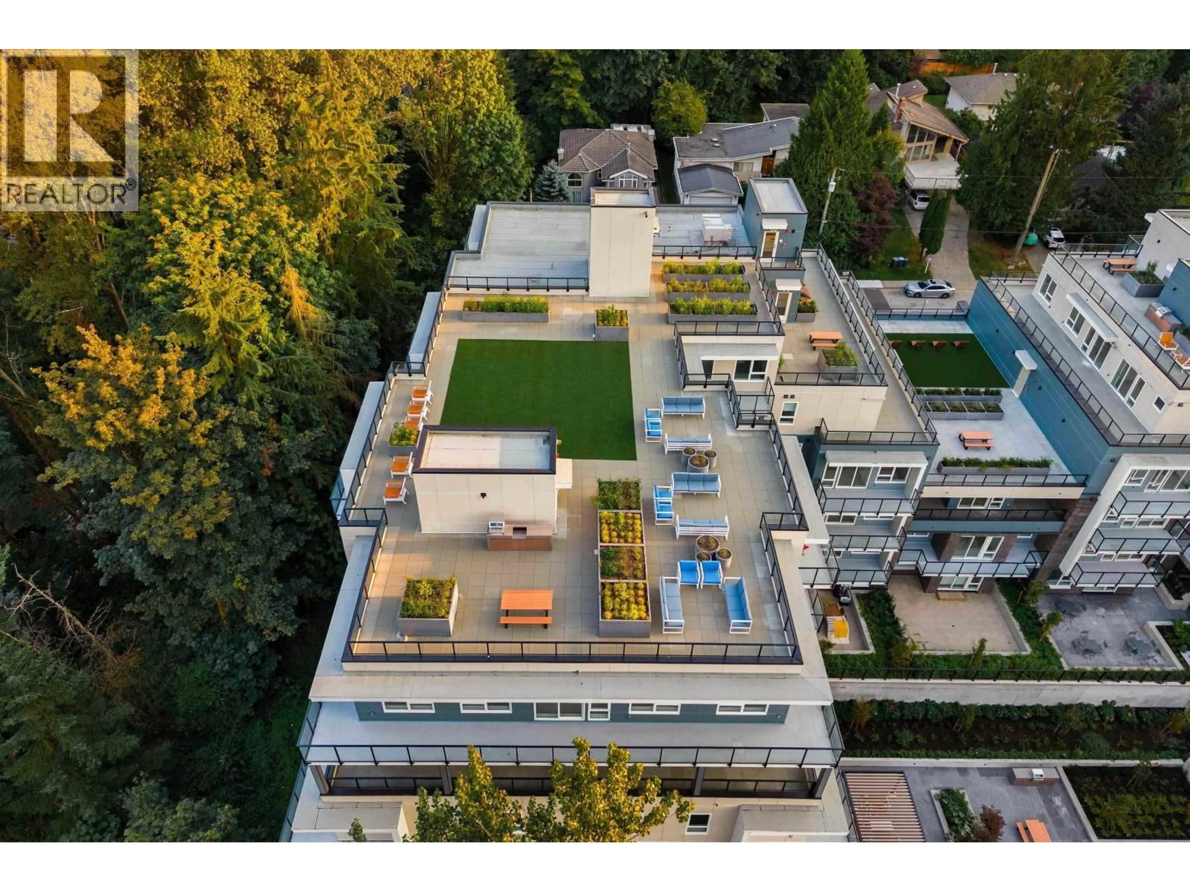 A pic from outside/outdoor area/front of a property/back of a property/a pic from drone, unknown for 103 - 2002 ST. GEORGE STREET, Port Moody British Columbia V3H2E6