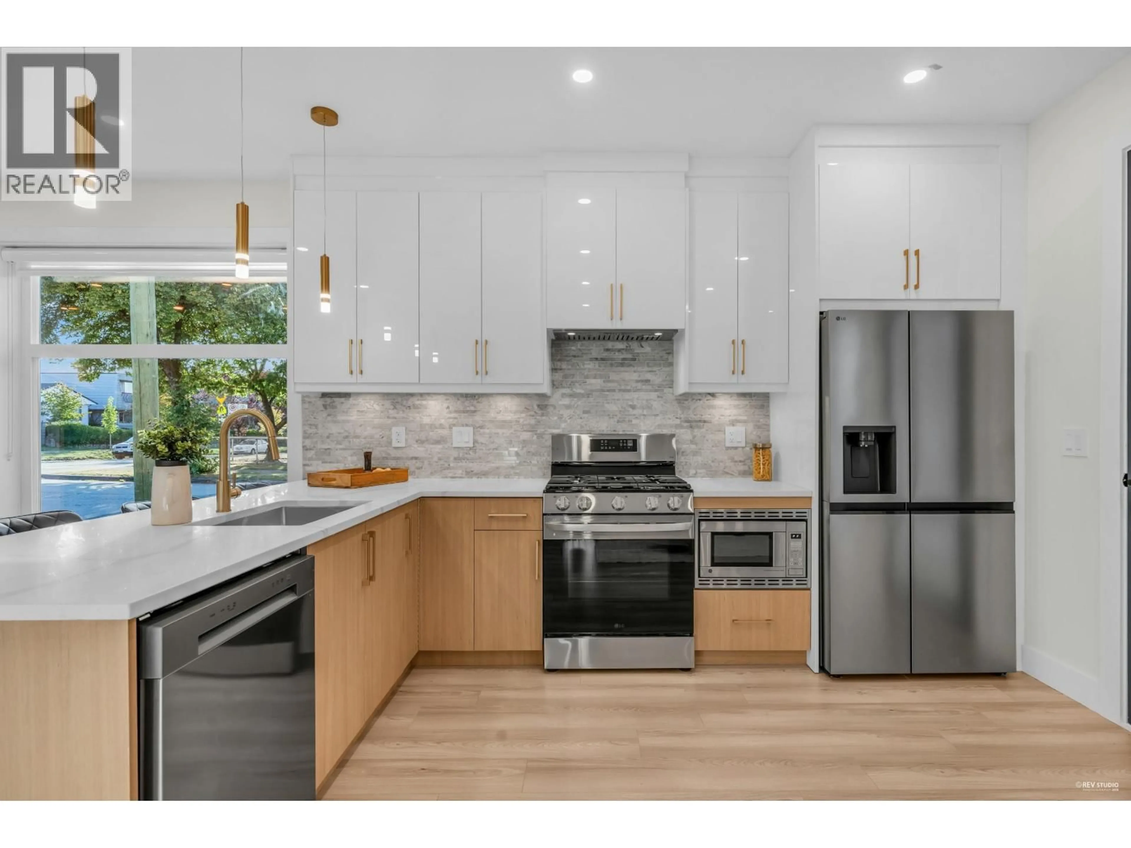 Open concept kitchen, unknown for 1 - 2705 EAST 3RD AVENUE, Vancouver British Columbia V5M1H3