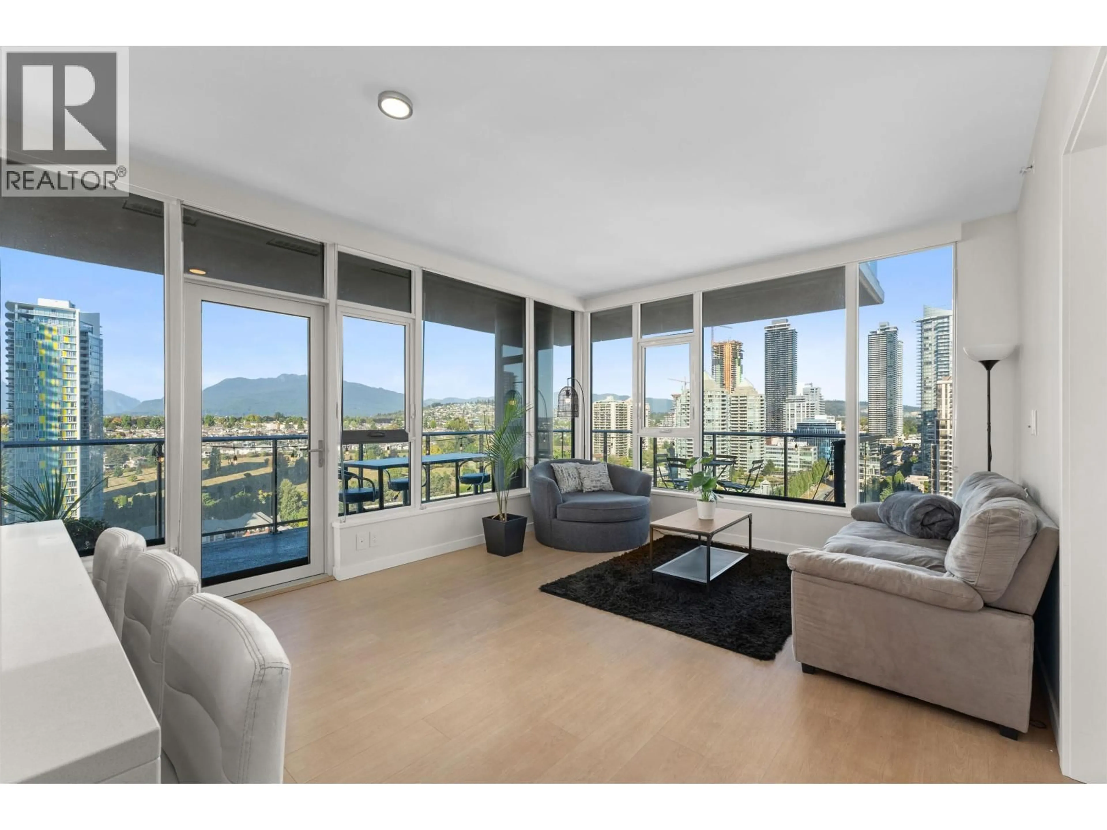 Living room with furniture, unknown for 2107 - 4168 LOUGHEED HIGHWAY, Burnaby British Columbia V5C0N9