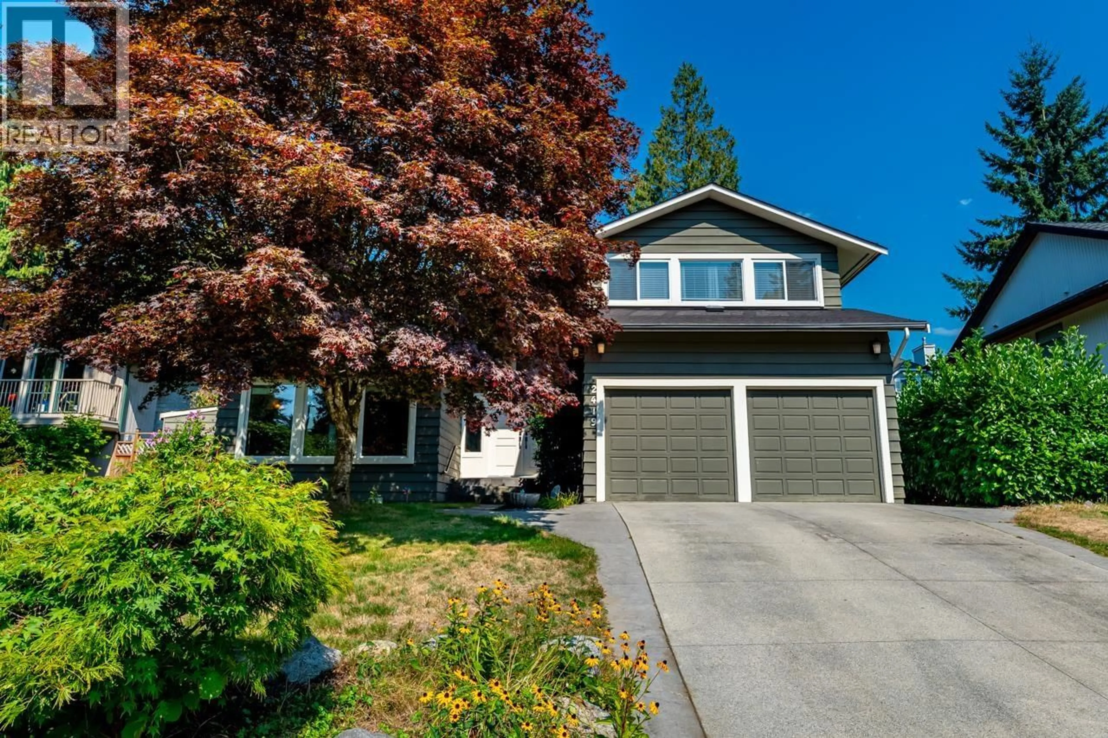 Home with vinyl exterior material, street for 2419 ORANDA AVENUE, Coquitlam British Columbia V3K3A5