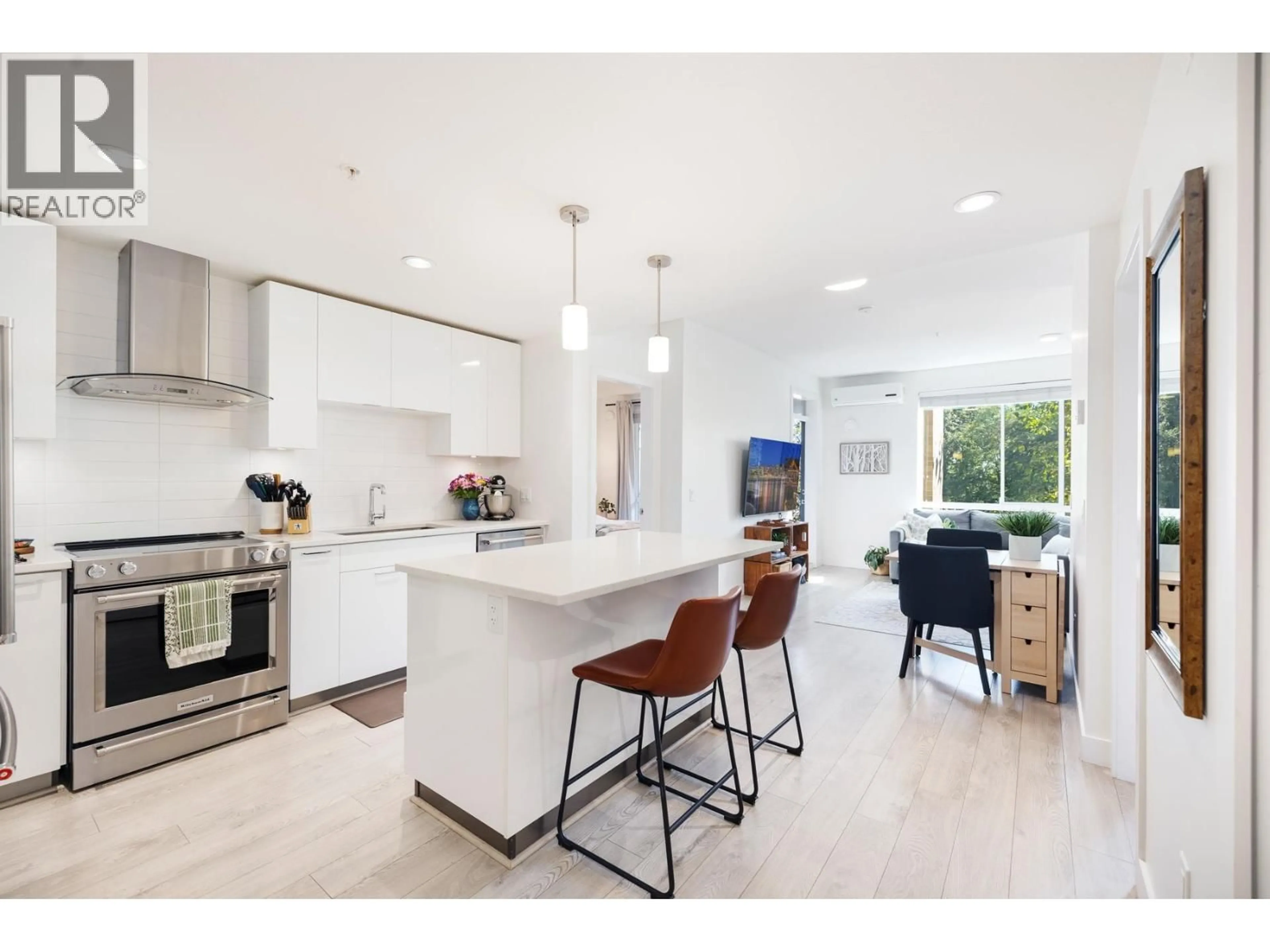 Open concept kitchen, unknown for 213 - 719 3RD STREET, North Vancouver British Columbia V7M0E7