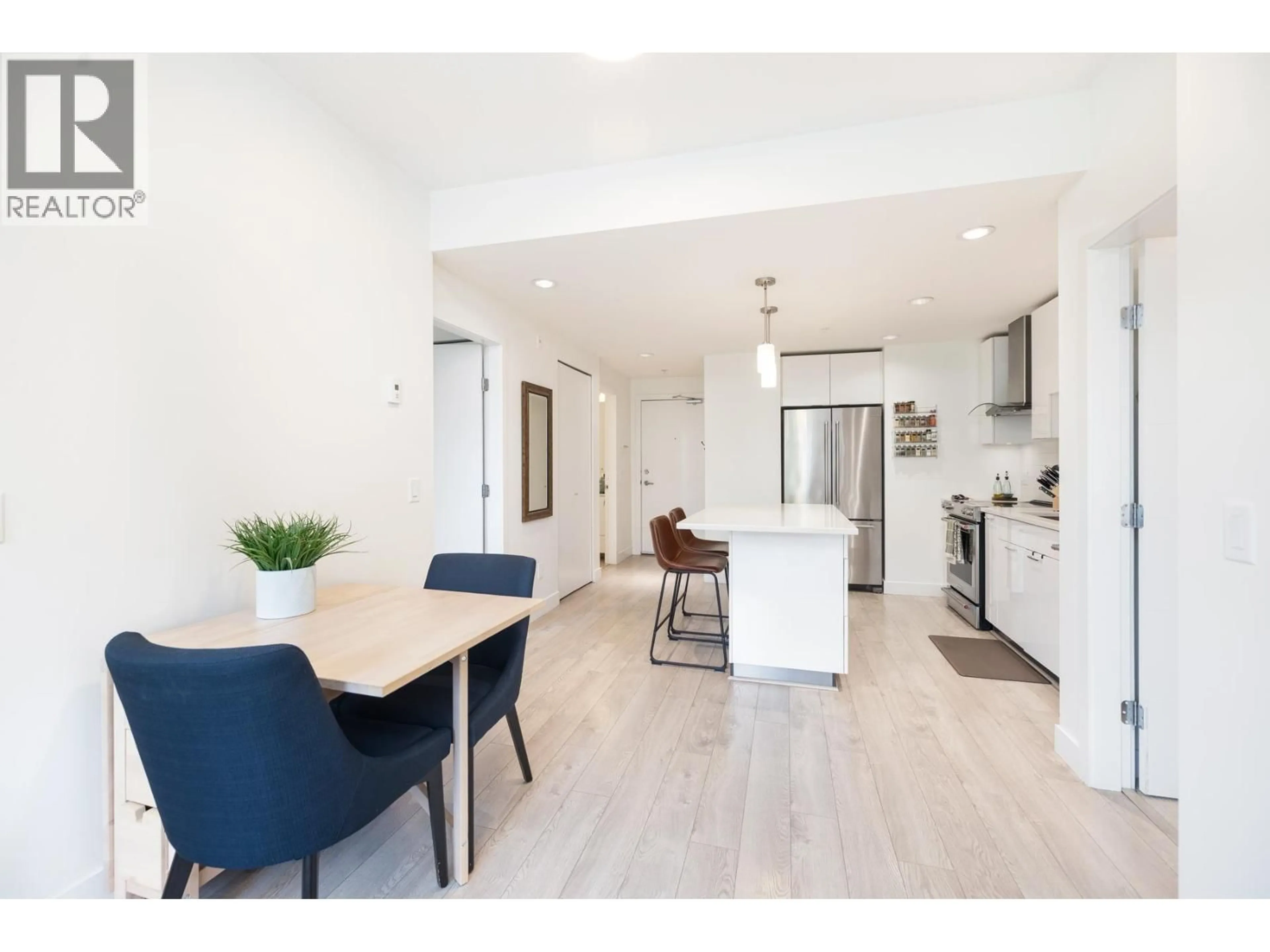 Open concept kitchen, unknown for 213 - 719 3RD STREET, North Vancouver British Columbia V7M0E7