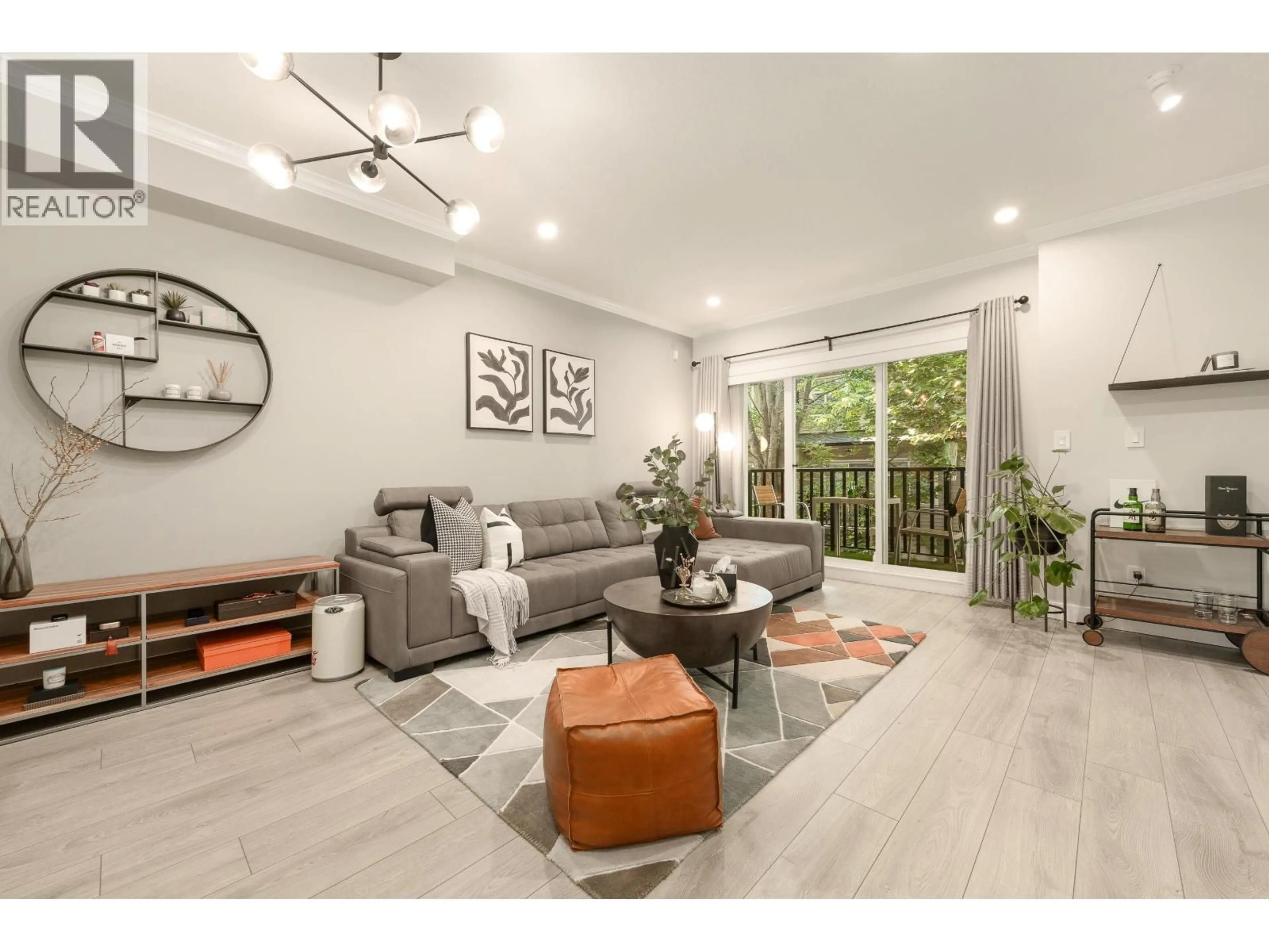 Living room with furniture, wood/laminate floor for 34 - 7051 ASH STREET, Richmond British Columbia V6Y2R9