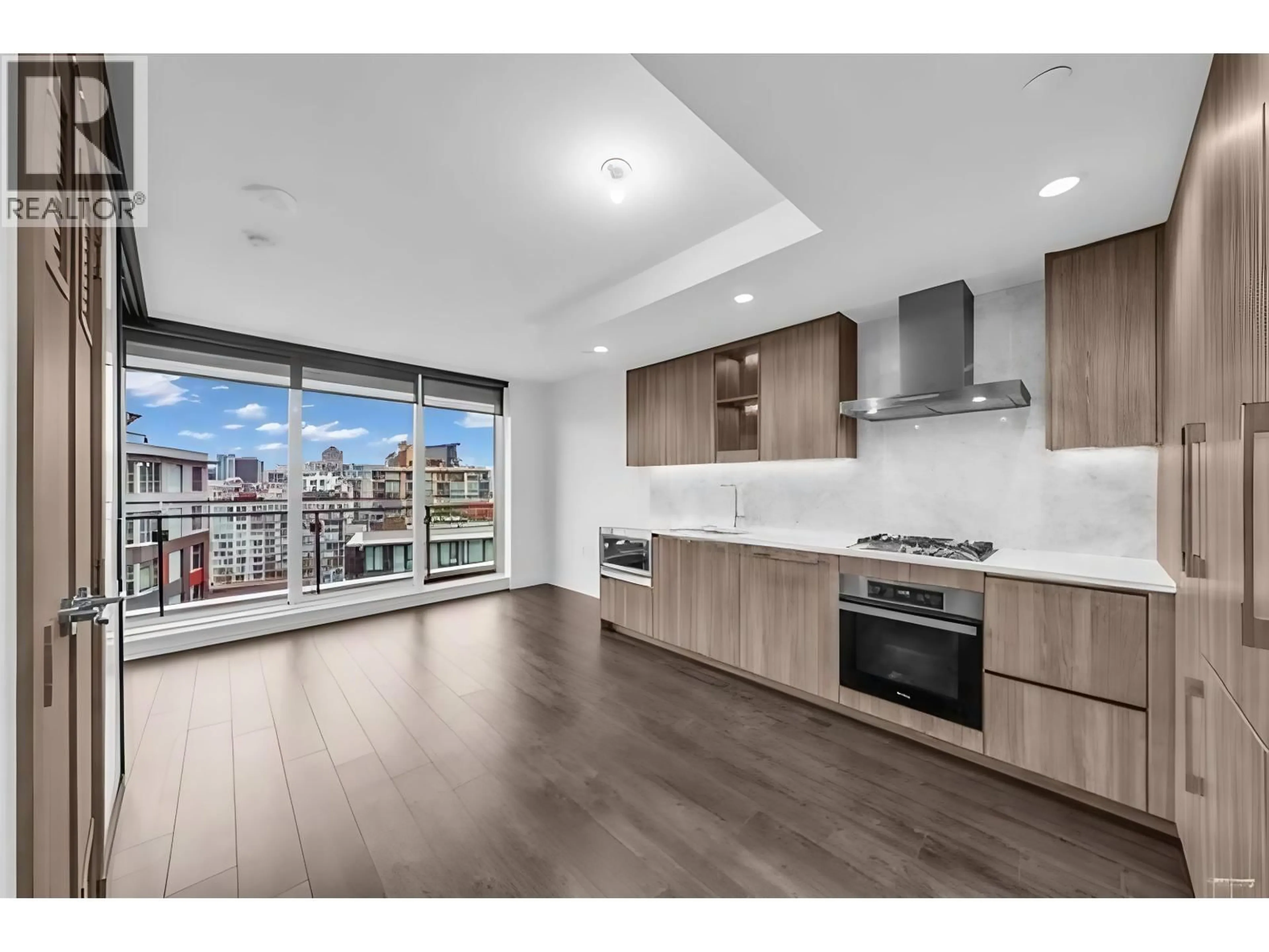 Open concept kitchen, wood/laminate floor for 1302 - 1768 COOK STREET, Vancouver British Columbia V5Y0N3