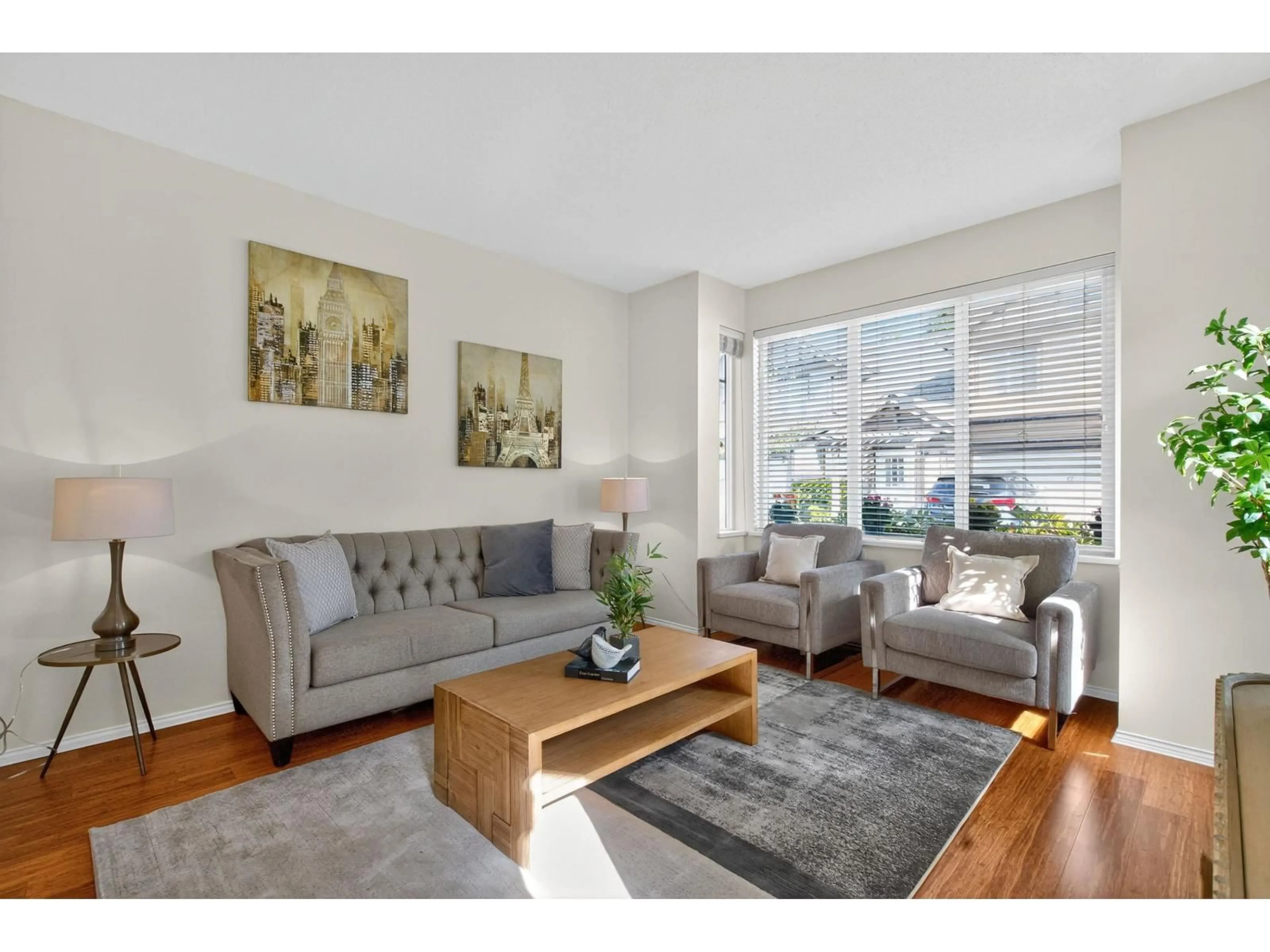 Living room with furniture, wood/laminate floor for 19 - 15868 85, Surrey British Columbia V4N0Y9