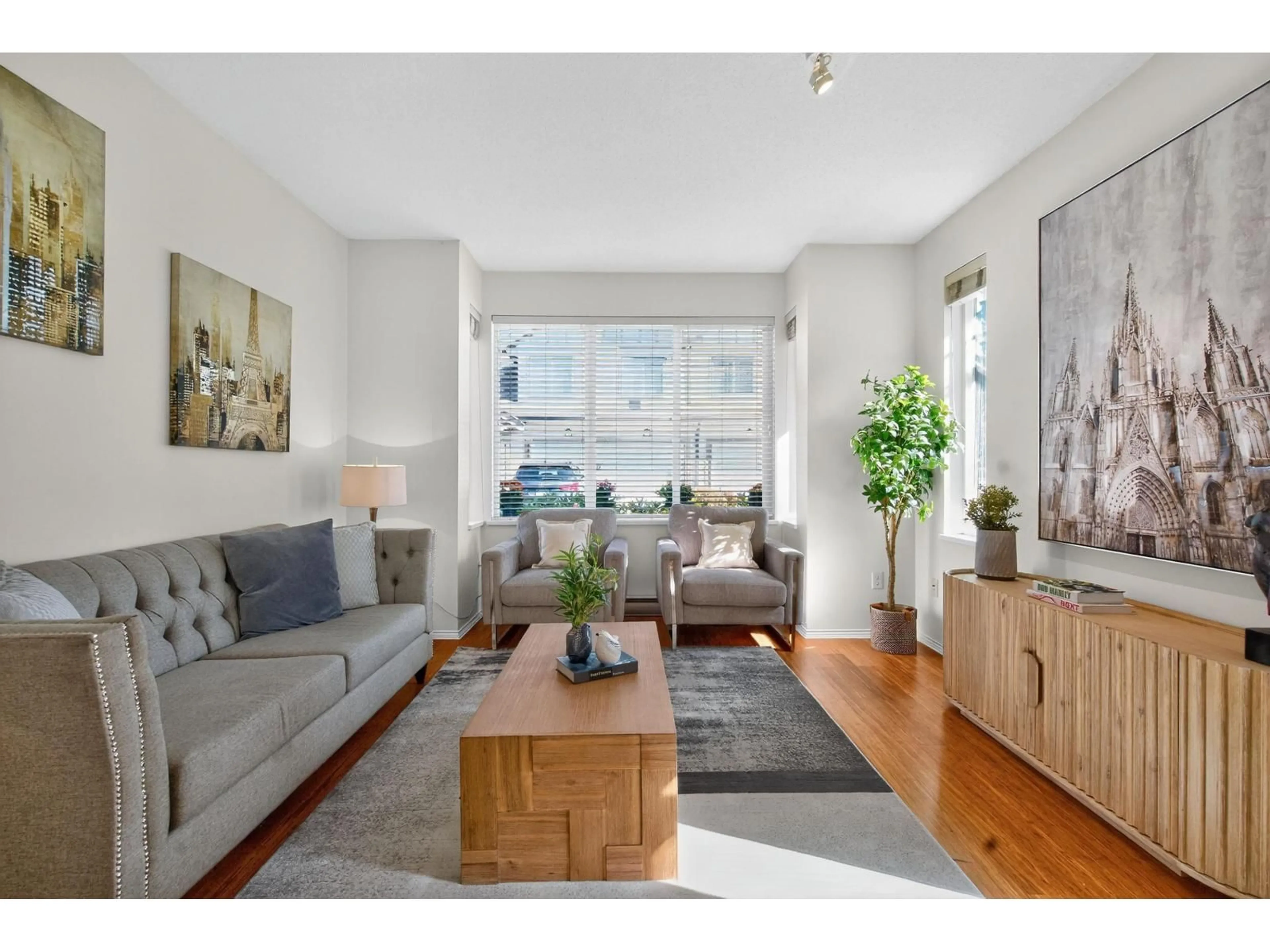 Living room with furniture, wood/laminate floor for 19 - 15868 85, Surrey British Columbia V4N0Y9