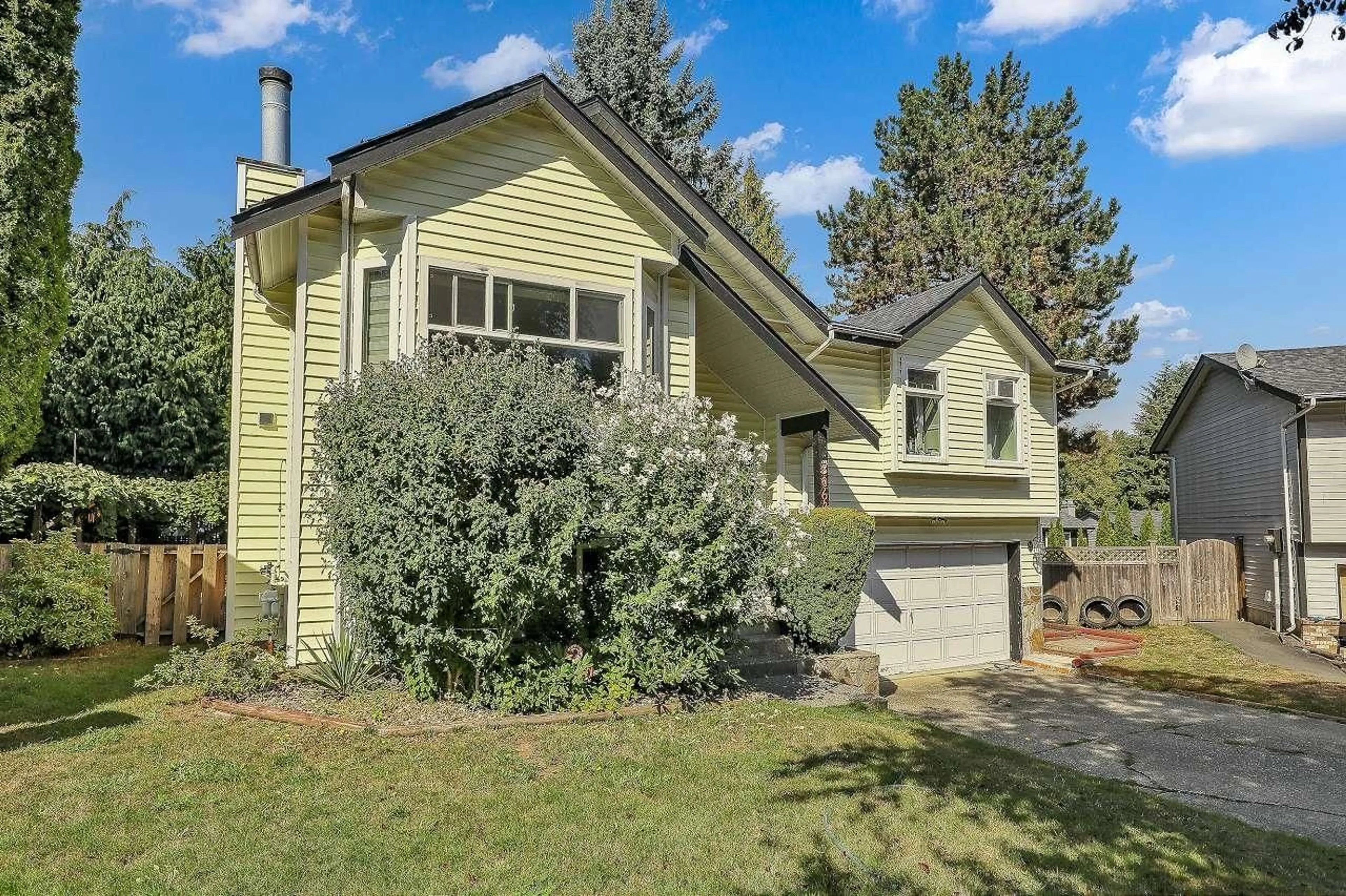 Home with vinyl exterior material, street for 8063 138A, Surrey British Columbia V3W9B3