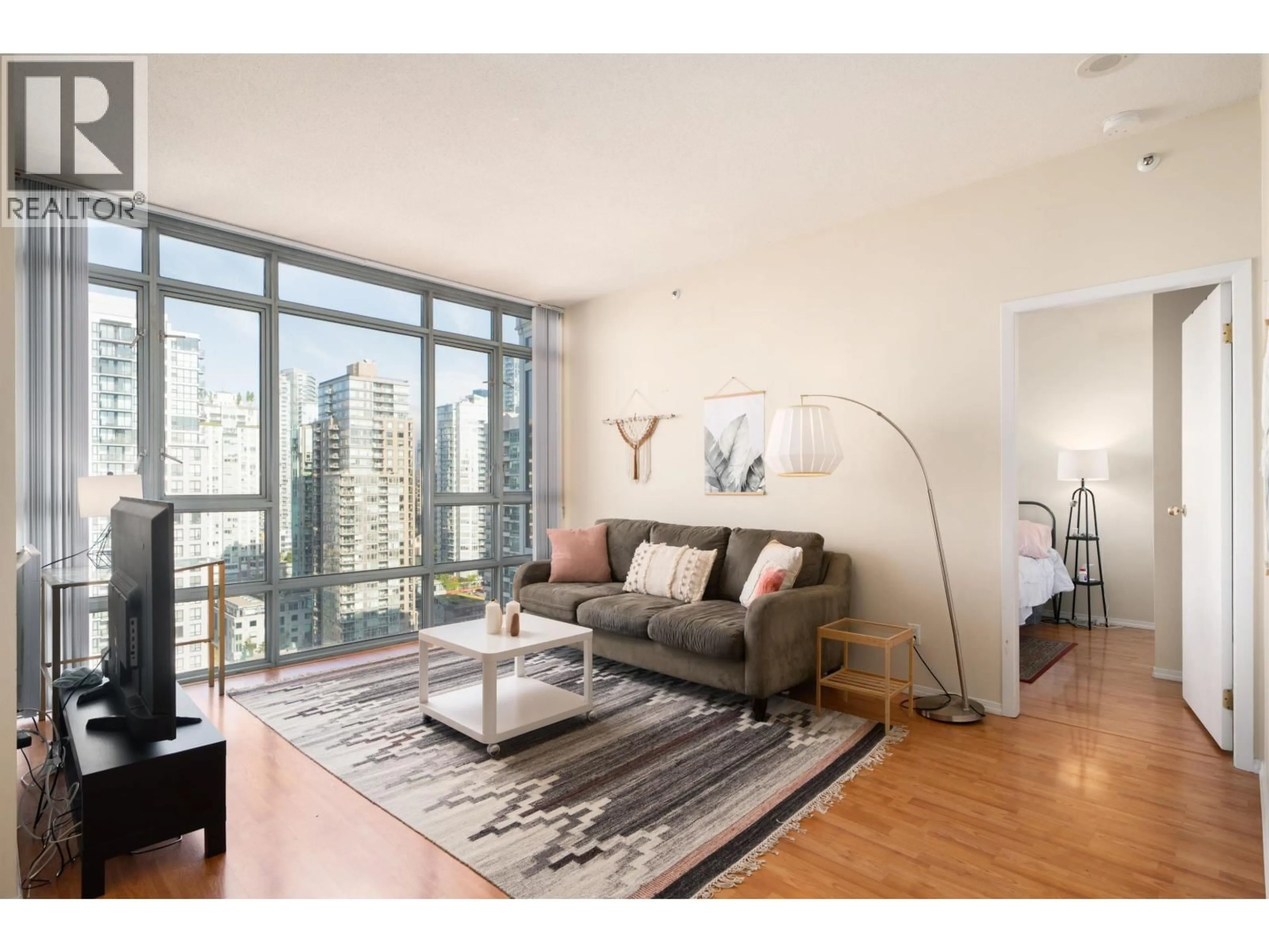 Living room with furniture, wood/laminate floor for 2905 - 930 CAMBIE STREET, Vancouver British Columbia V6B5X6