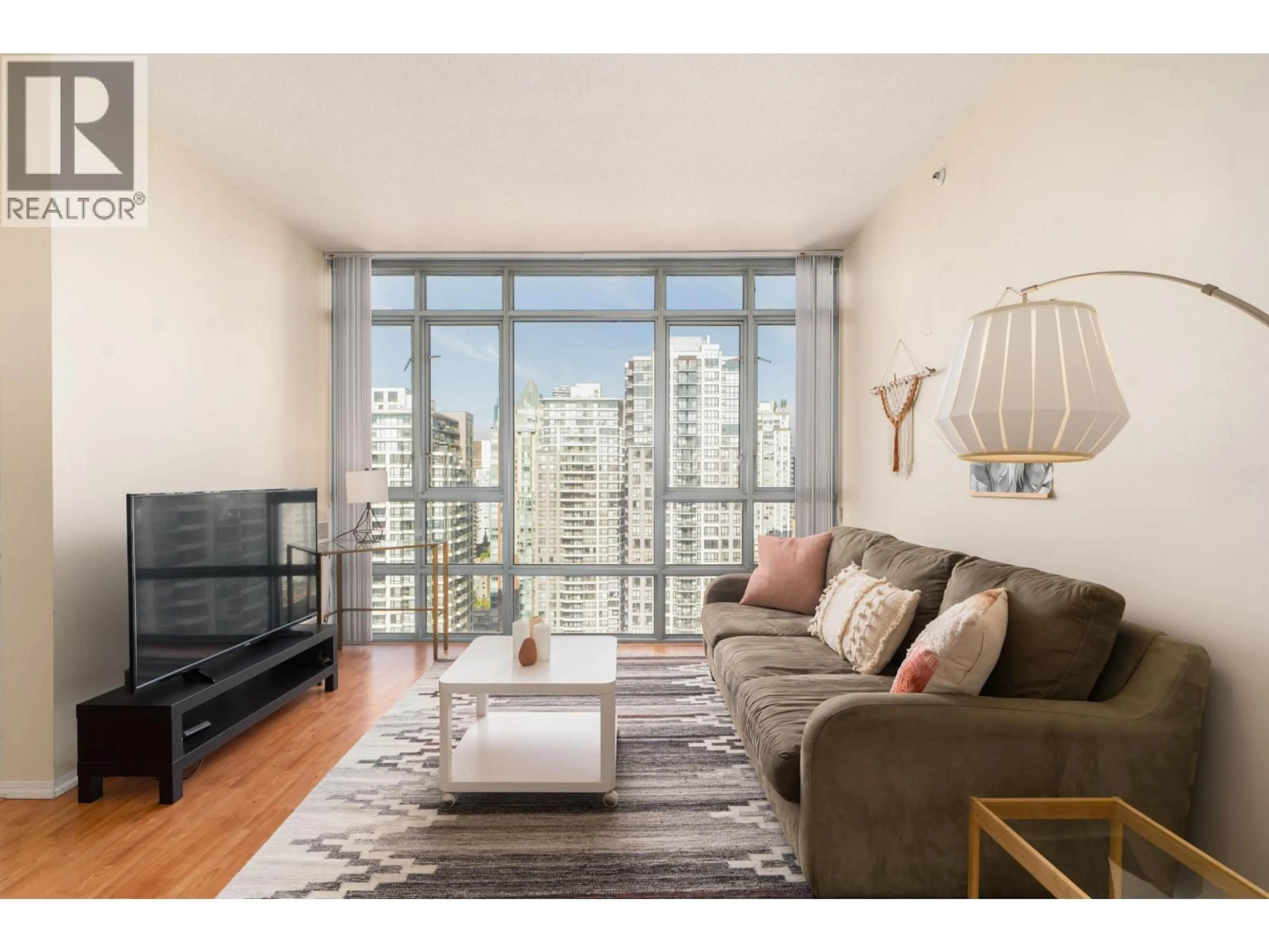 Living room with furniture, wood/laminate floor for 2905 - 930 CAMBIE STREET, Vancouver British Columbia V6B5X6