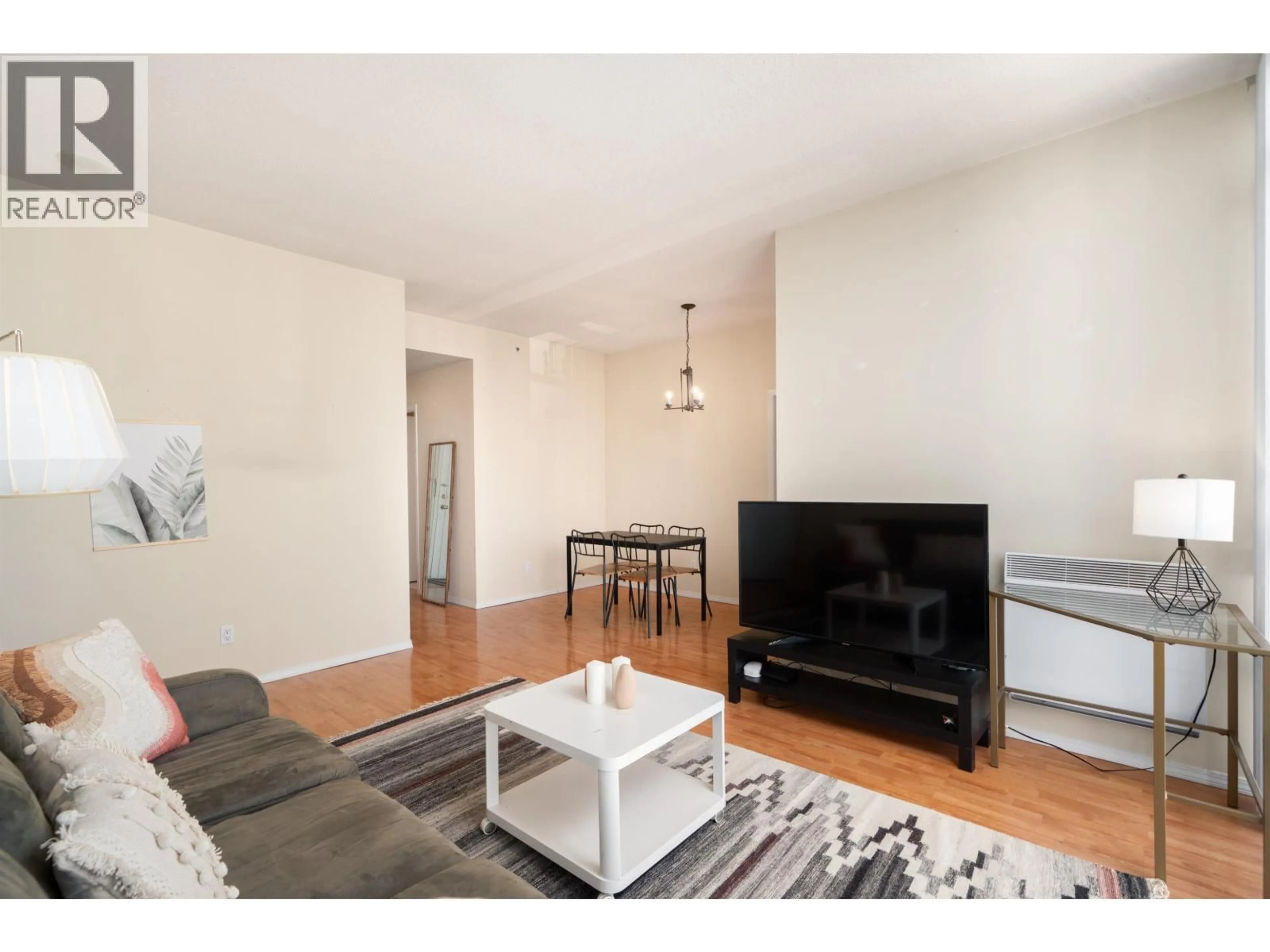 Living room with furniture, wood/laminate floor for 2905 - 930 CAMBIE STREET, Vancouver British Columbia V6B5X6