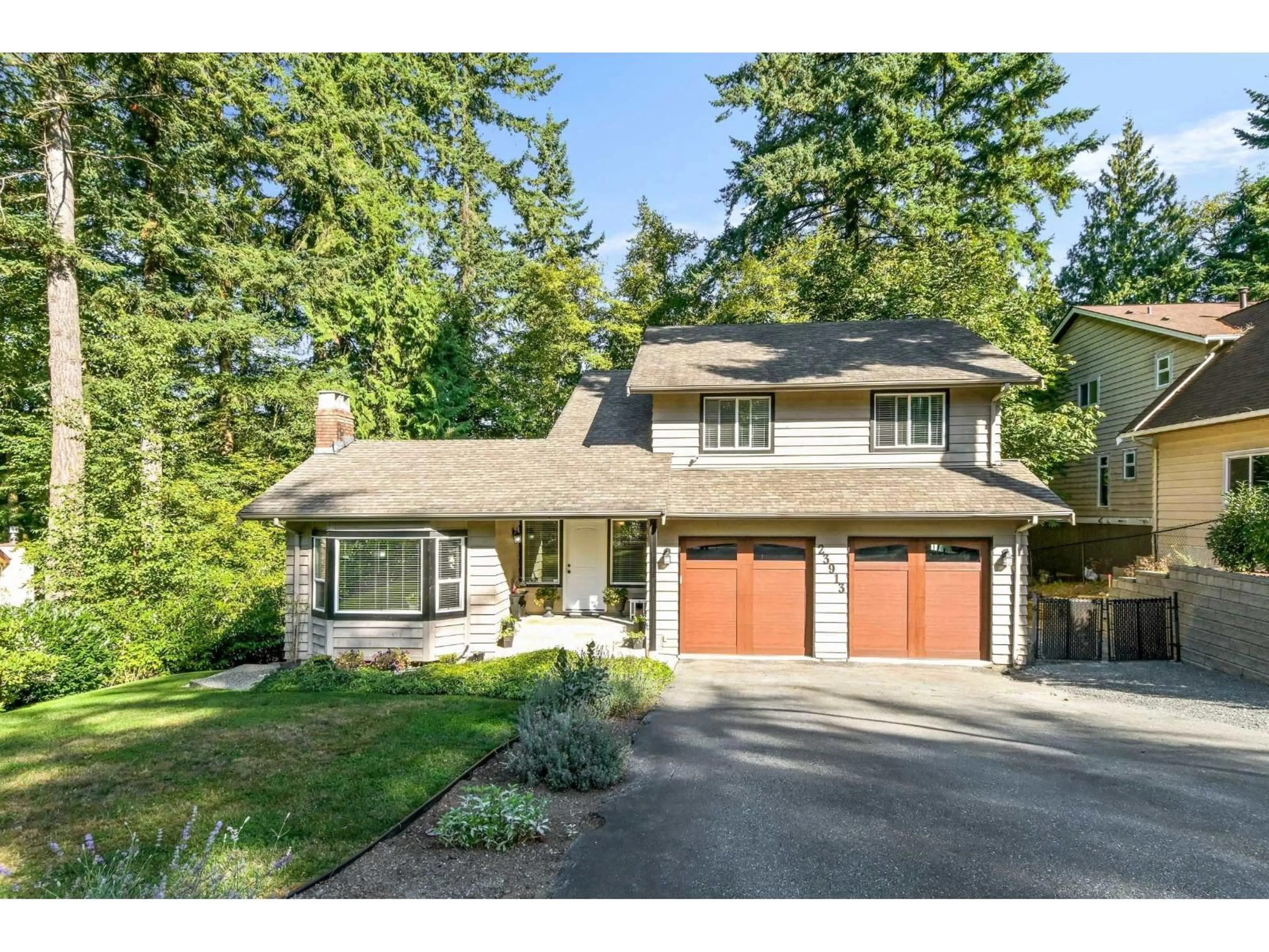 Home with vinyl exterior material, street for 23913 58A, Langley British Columbia V2Z1A5