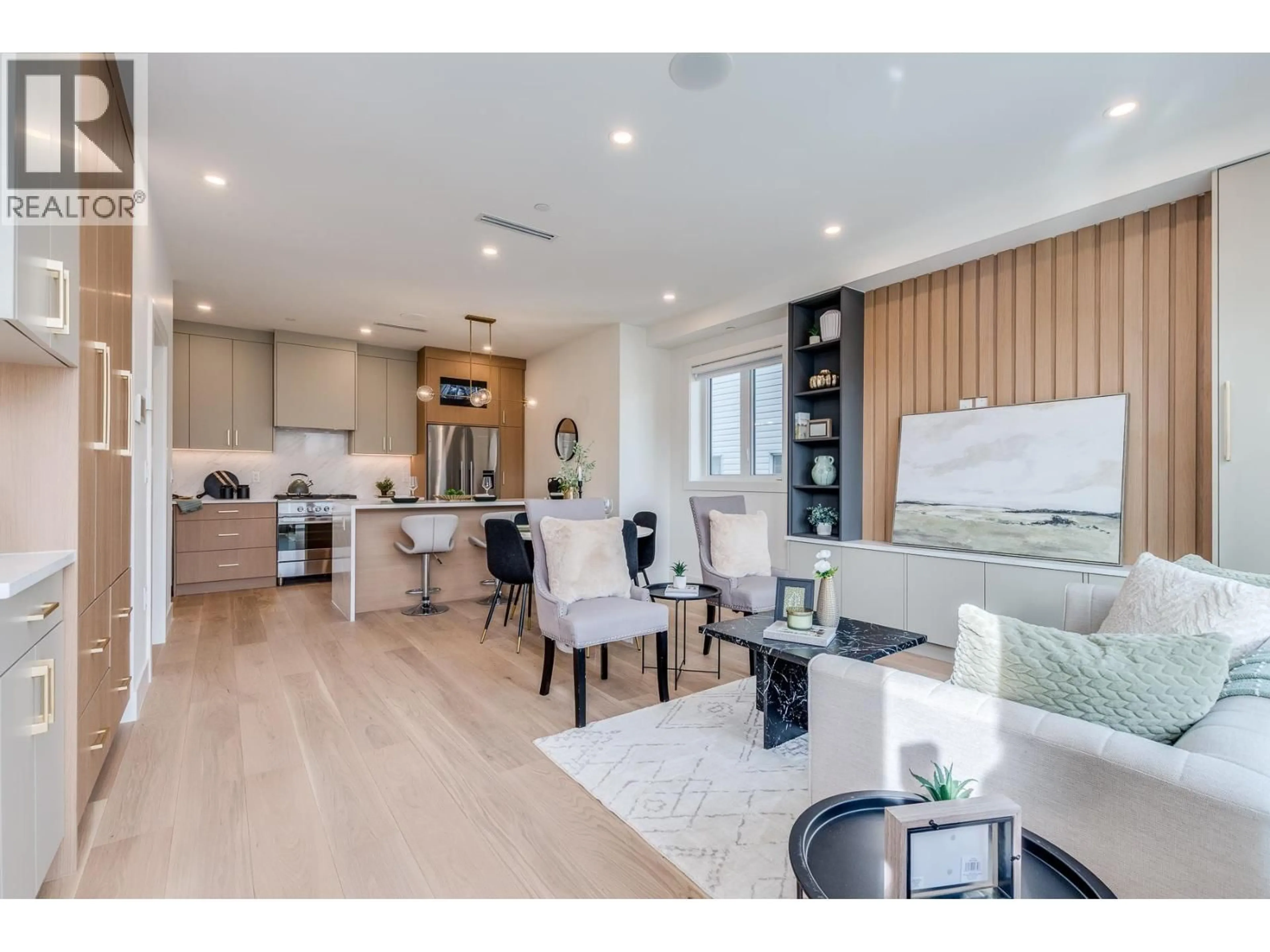 Open concept kitchen, wood/laminate floor for 2261 35TH AVENUE, Vancouver British Columbia V5P1C1