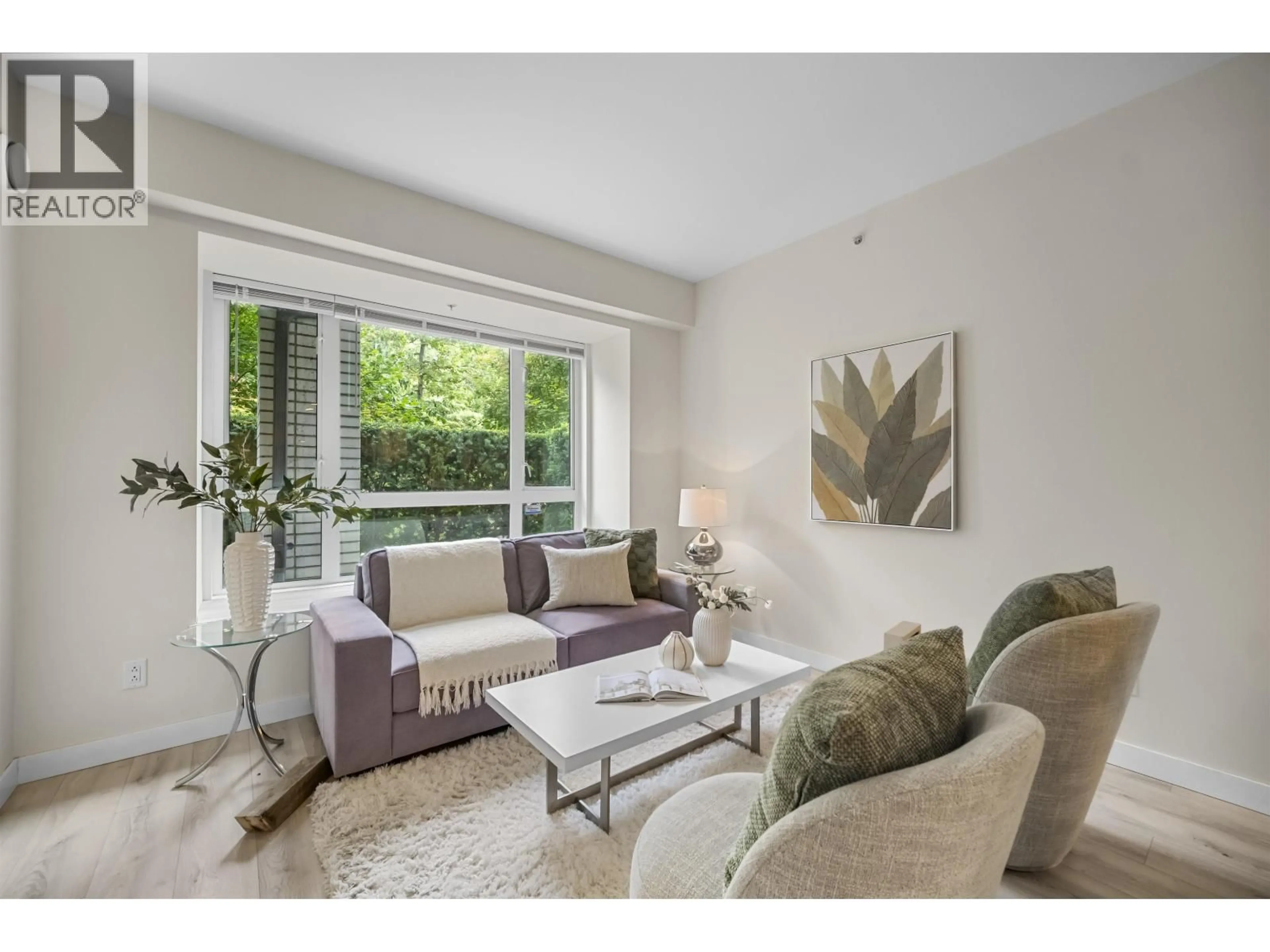 Living room with furniture, unknown for 207 - 9350 UNIVERSITY HIGH STREET, Burnaby British Columbia V5A0B6