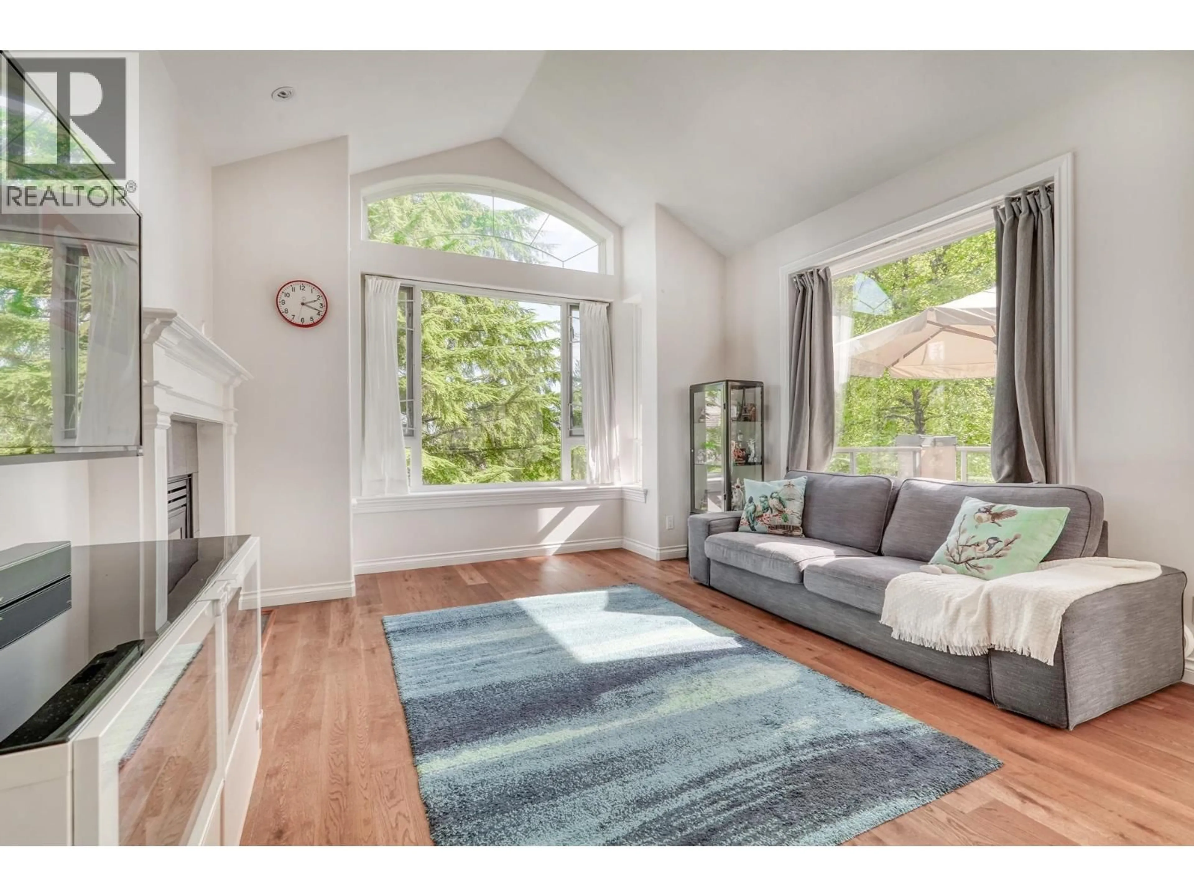 Living room with furniture, unknown for 206 - 3280 PLATEAU BOULEVARD, Coquitlam British Columbia V3E3J5