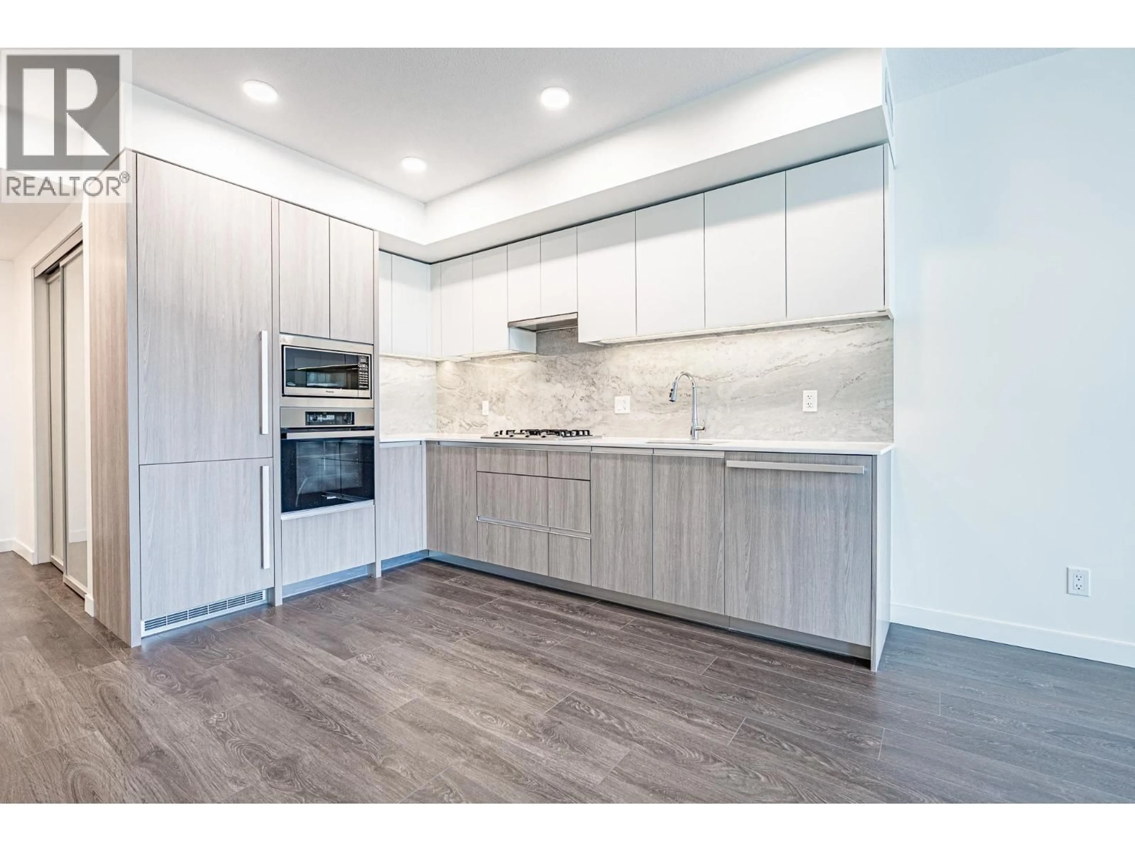 Open concept kitchen, wood/laminate floor for 607 - 6633 BUSWELL STREET, Richmond British Columbia V6Y0M3