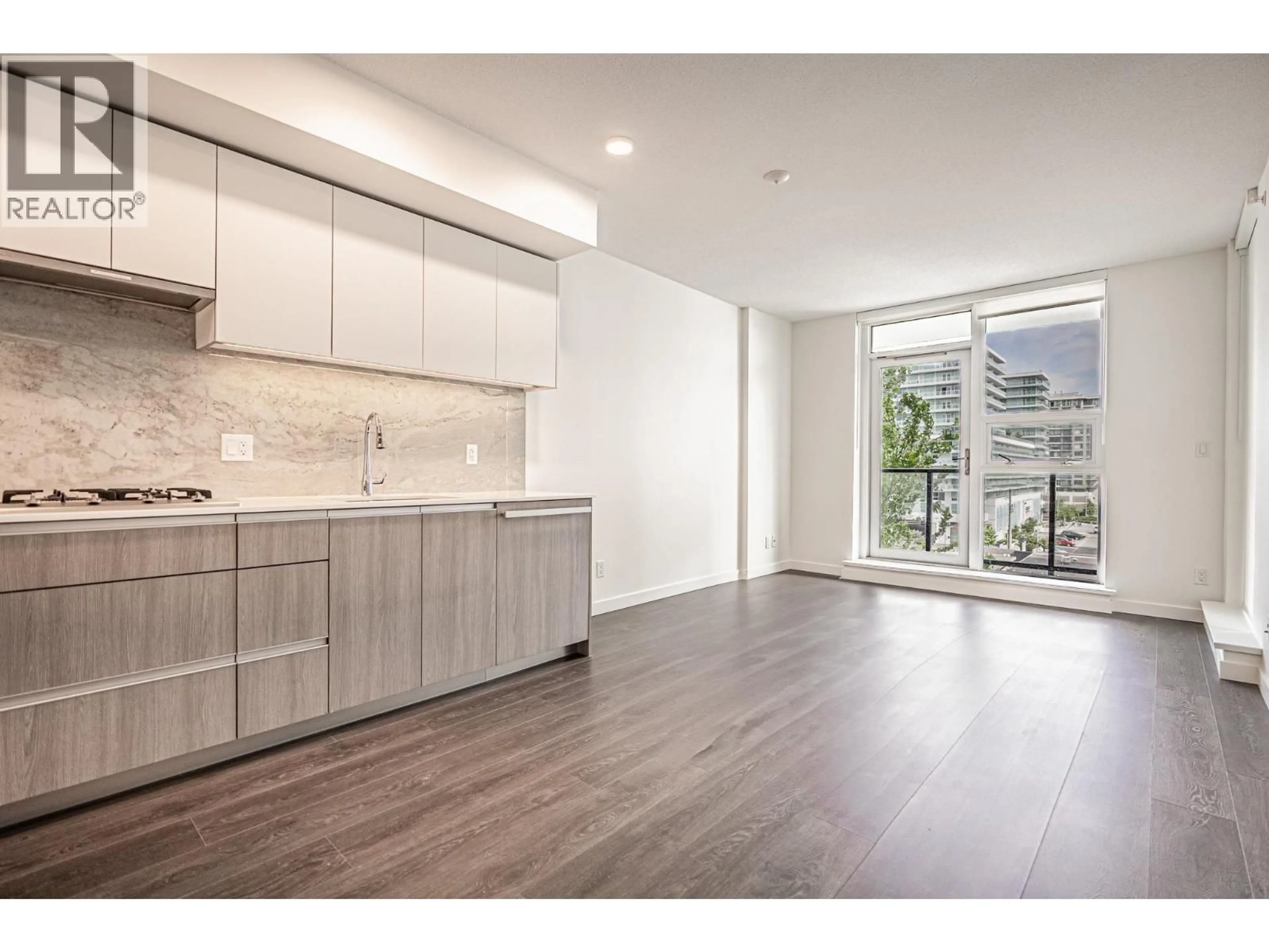 Open concept kitchen, wood/laminate floor for 607 - 6633 BUSWELL STREET, Richmond British Columbia V6Y0M3