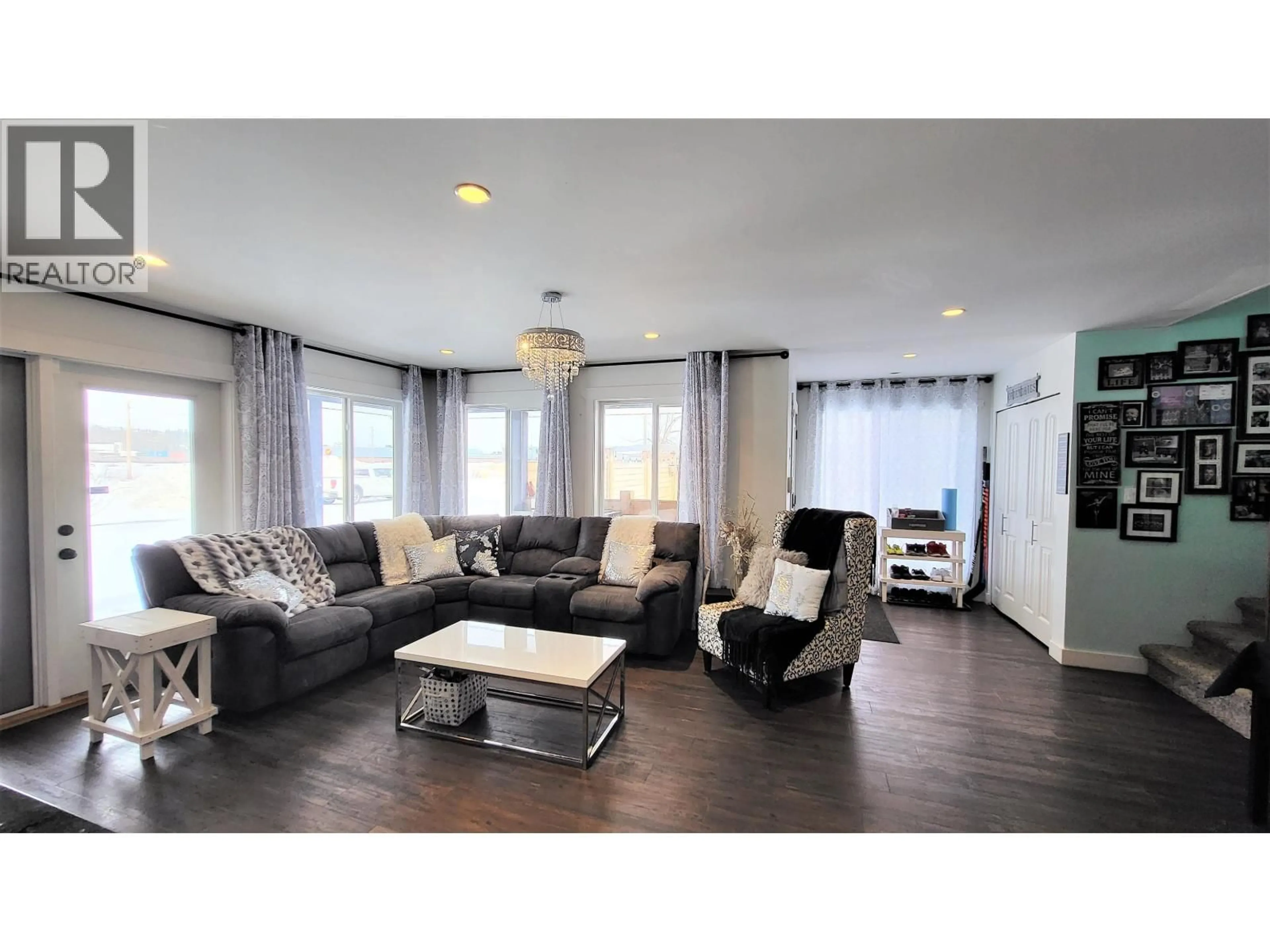 Living room with furniture, wood/laminate floor for 2233 LAW AVENUE, Houston British Columbia V0J1Z0