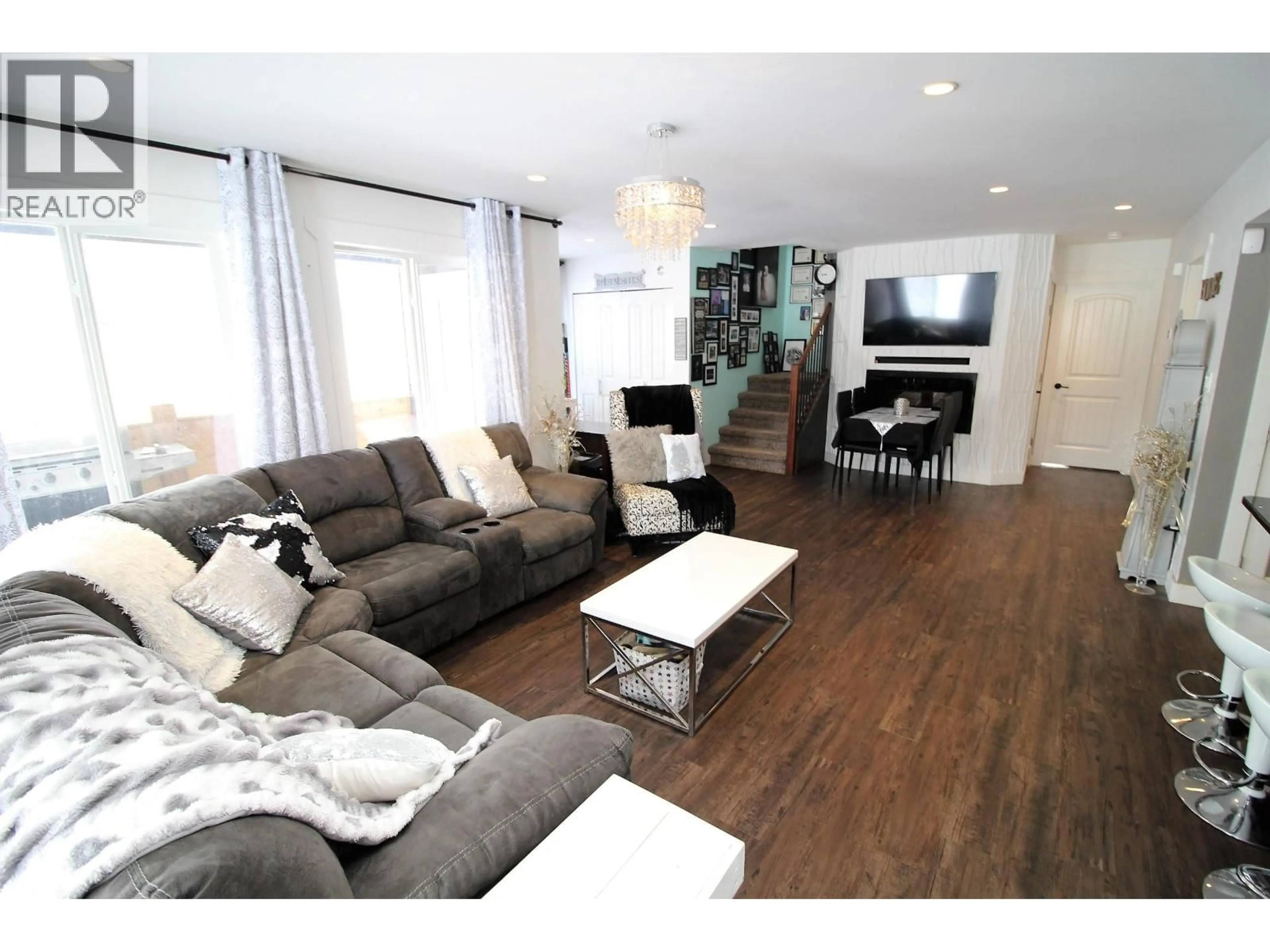 Living room with furniture, wood/laminate floor for 2233 LAW AVENUE, Houston British Columbia V0J1Z0