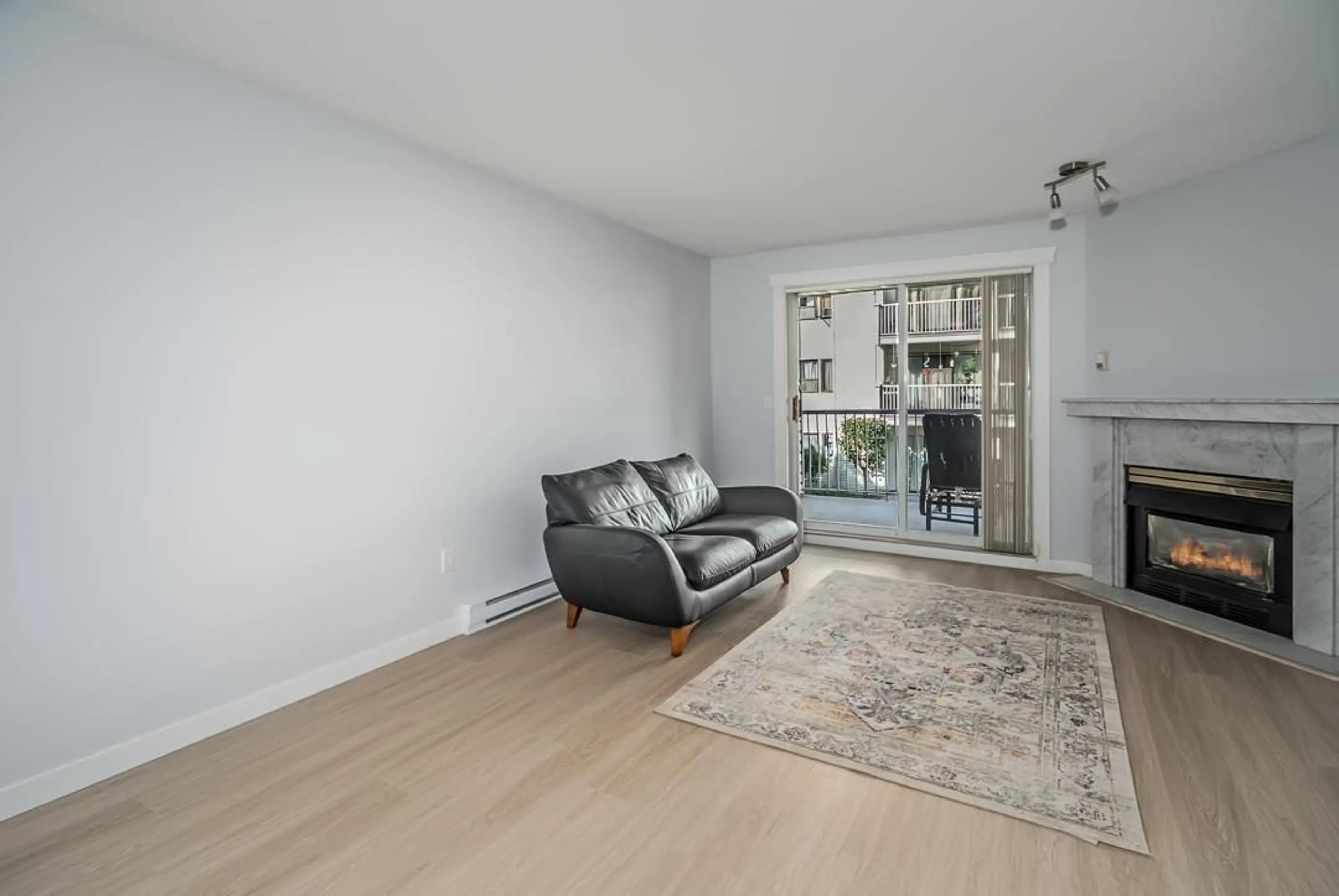 Living room with furniture, wood/laminate floor for 111 - 8985 MARY STREET, Chilliwack British Columbia V2P4J4