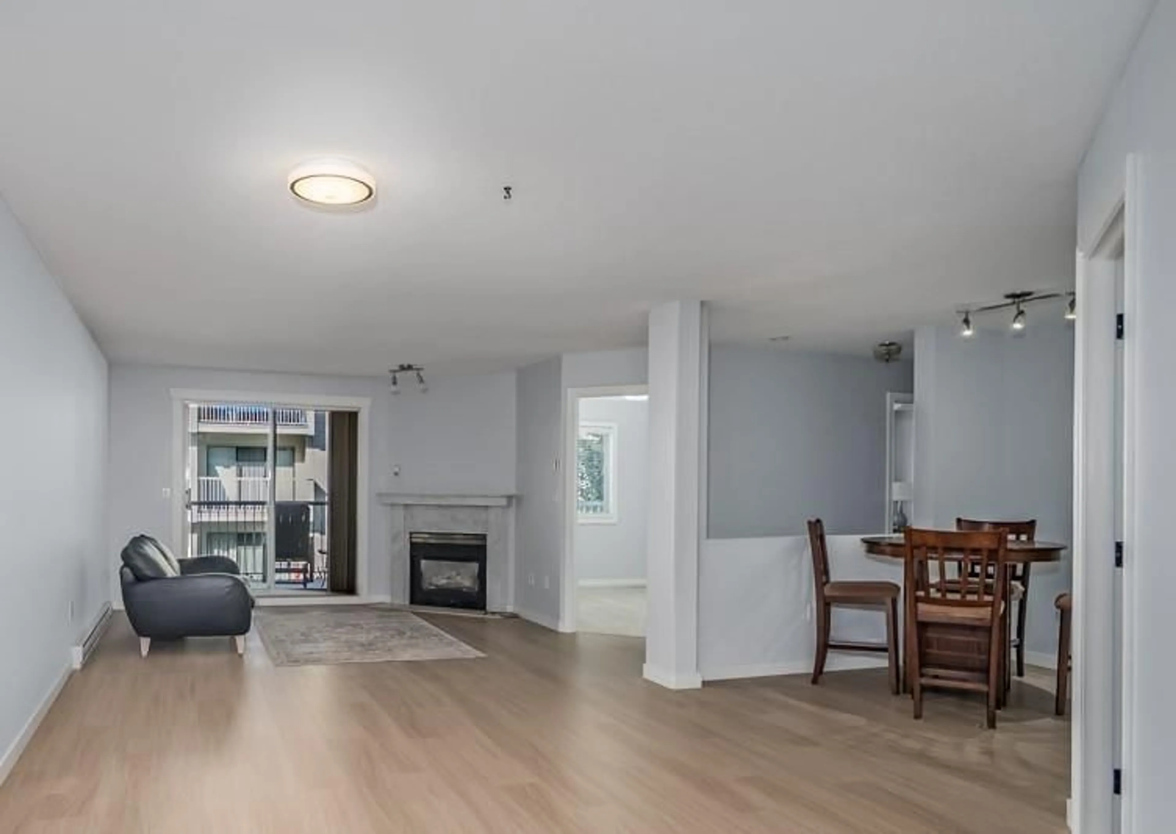 Living room with furniture, wood/laminate floor for 111 - 8985 MARY STREET, Chilliwack British Columbia V2P4J4