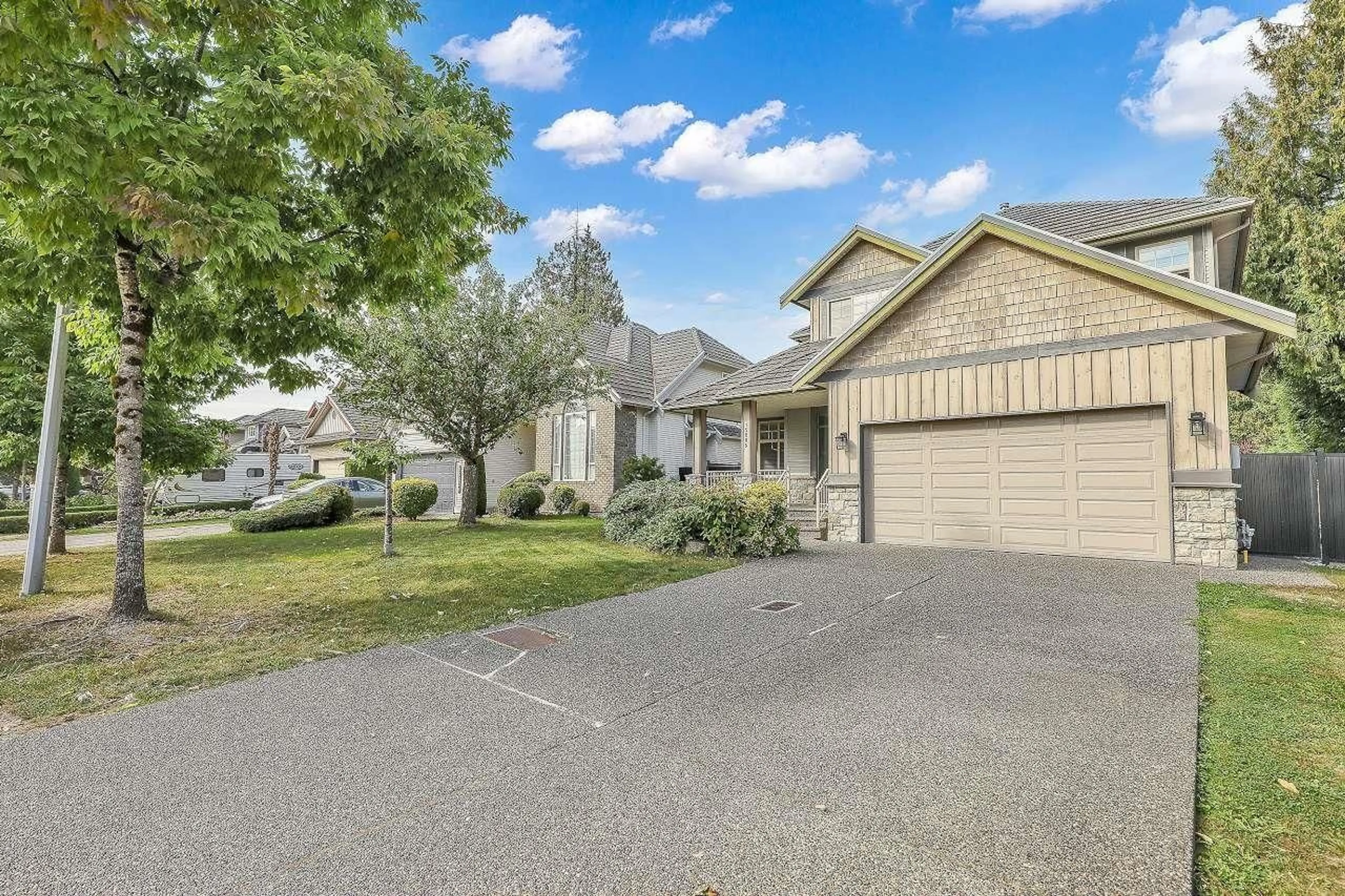 A pic from outside/outdoor area/front of a property/back of a property/a pic from drone, street for 15885 110, Surrey British Columbia V4N5E9