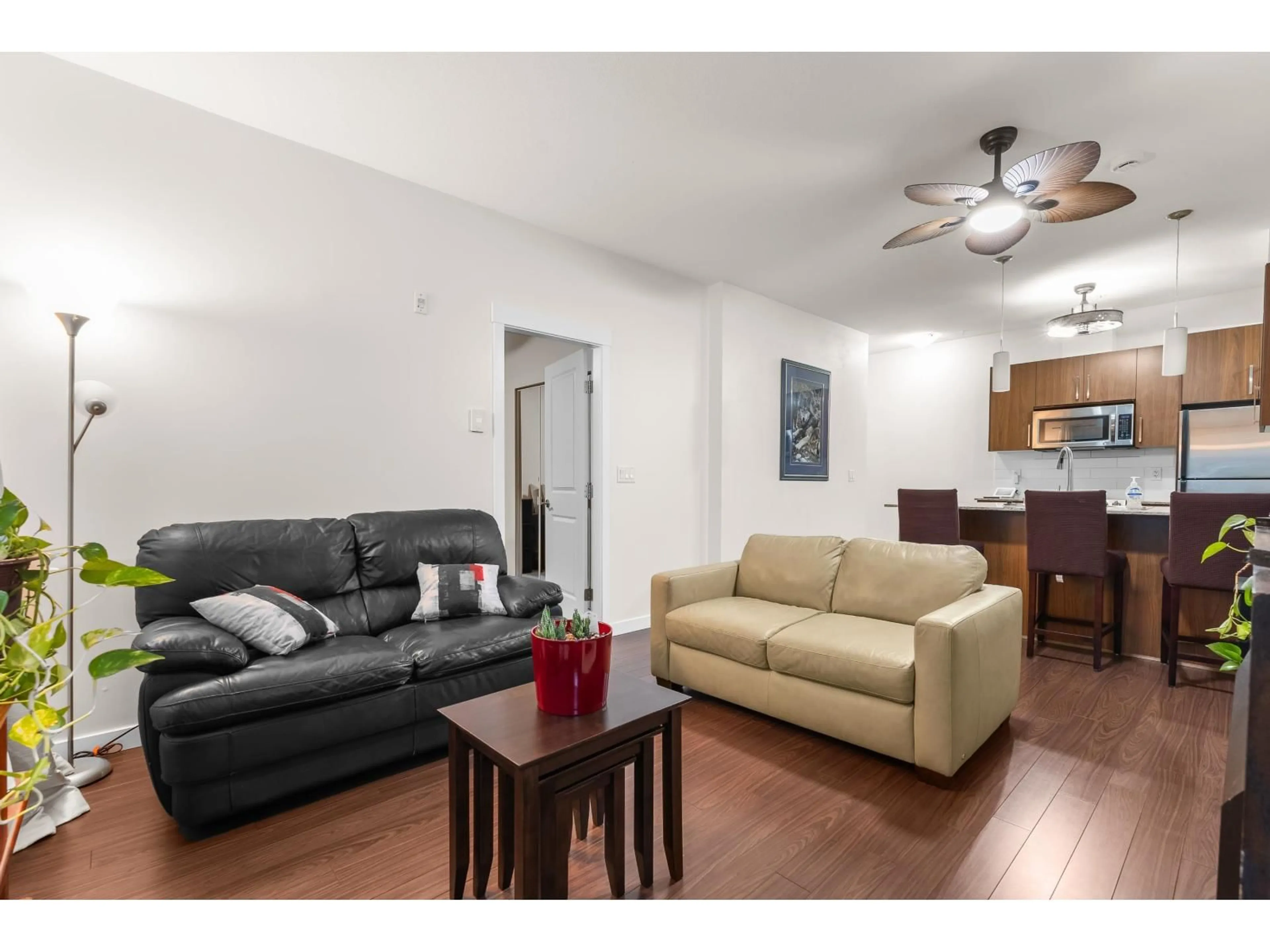 Living room with furniture, wood/laminate floor for 101 - 2943 NELSON, Abbotsford British Columbia V2S0C8