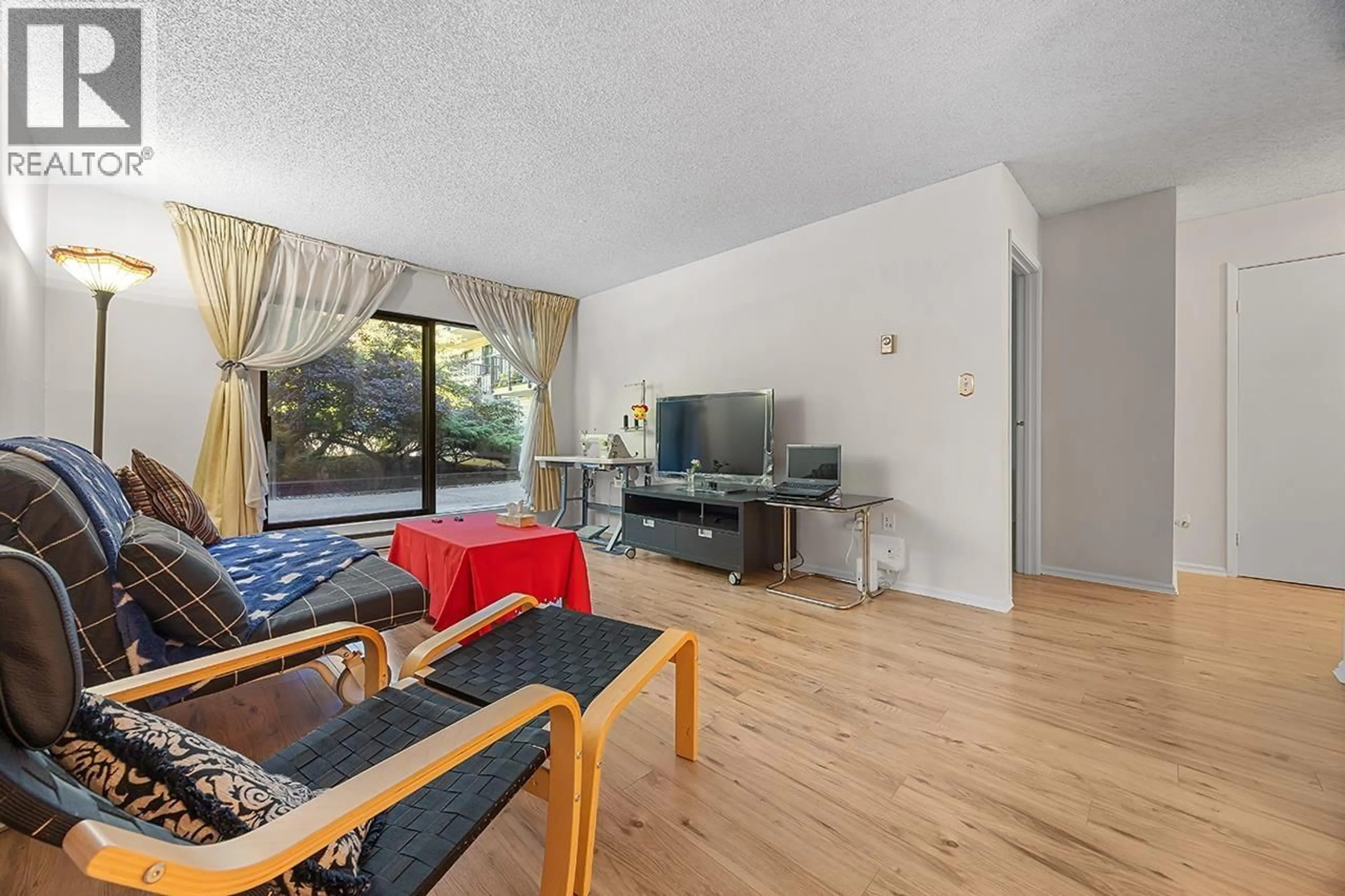 Living room with furniture, wood/laminate floor for 109 - 8231 GRANVILLE AVENUE, Richmond British Columbia V6Y3A4