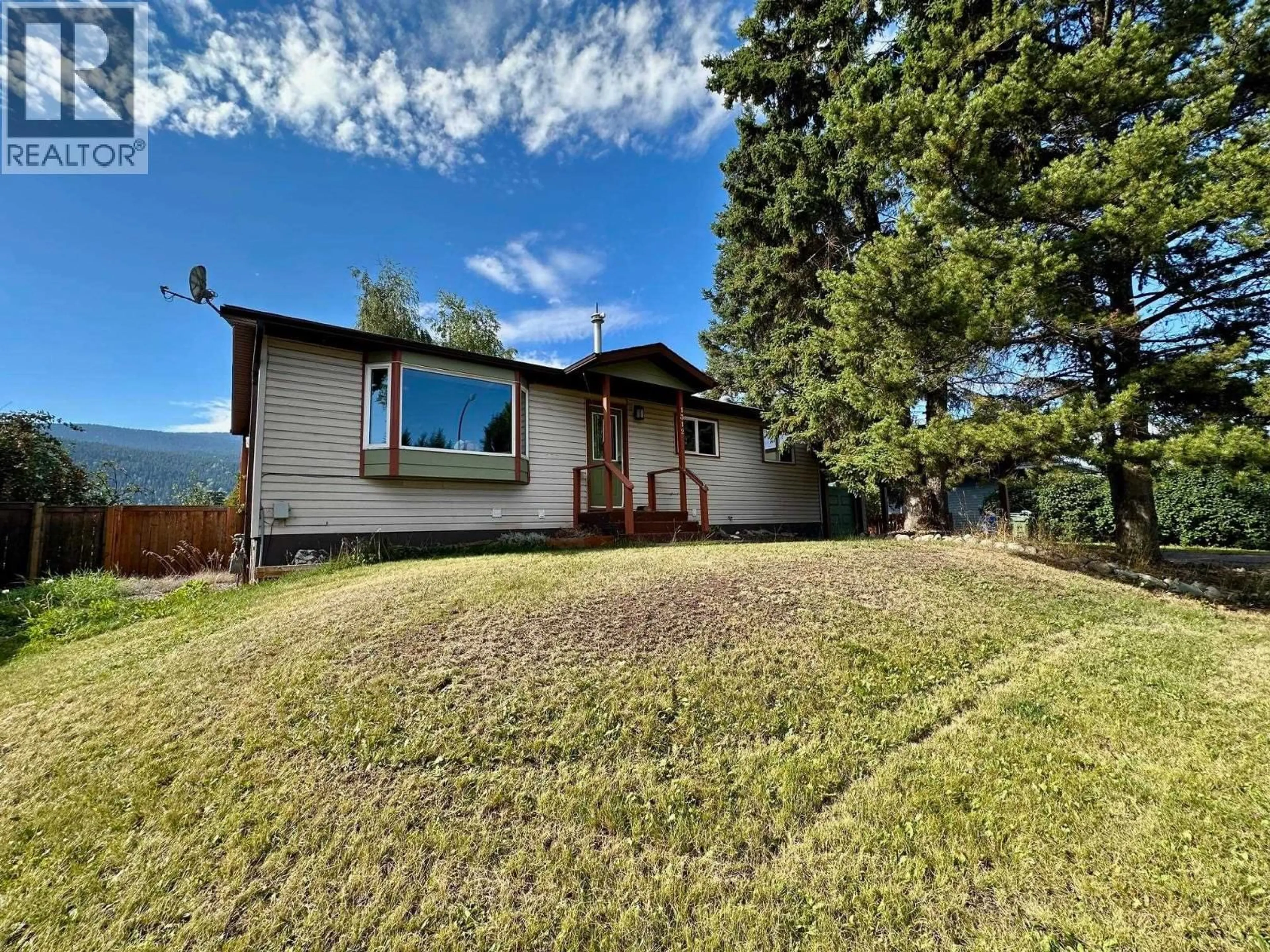 A pic from outside/outdoor area/front of a property/back of a property/a pic from drone, mountain view for 1312 MORICE DRIVE, Smithers British Columbia V0J2N0